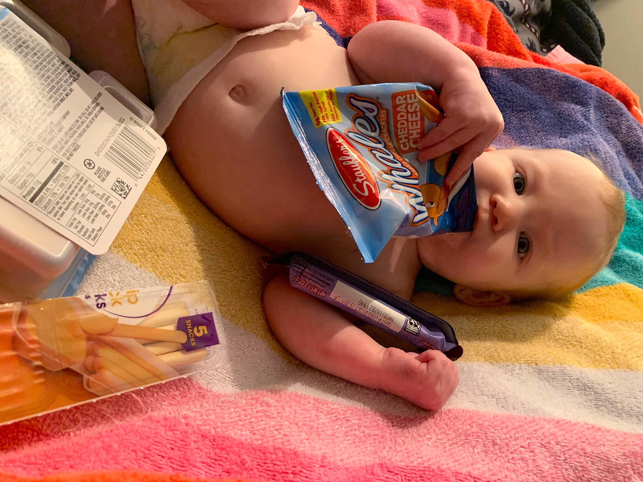 Kora is registered to the contest to win money with this photo: carmine, chest, child, eyelash, eyewear, fashion_accessory, foot, happy, human_body, human_leg, lip, material_property, nail, office_supplies, person, sitting, skin, thigh, thumb, toddler