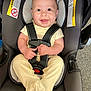 Tyree joined the competition — help win amazing prizes! baby, car_seat, infant, smiling, yellow_clothing, safety_harness, happy, cute, child, indoor, warning_label, seatbelt, person, face, human, young_child, infancy, comfort, clothing, seat