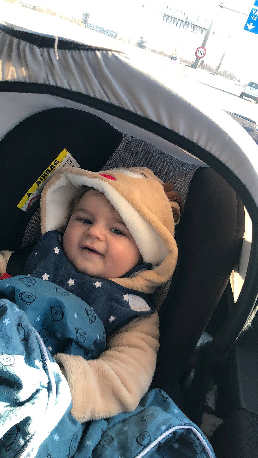 Joseph participe au concours pour gagner de l'argent avec cette photo : auto_part, baby, baby_carriage, baby_products, baby_safety, baby_toddler_clothing, car_seat, cheek, child, comfort, fun, hat, headwear, person, product, sitting, toddler, vehicle_door, winter