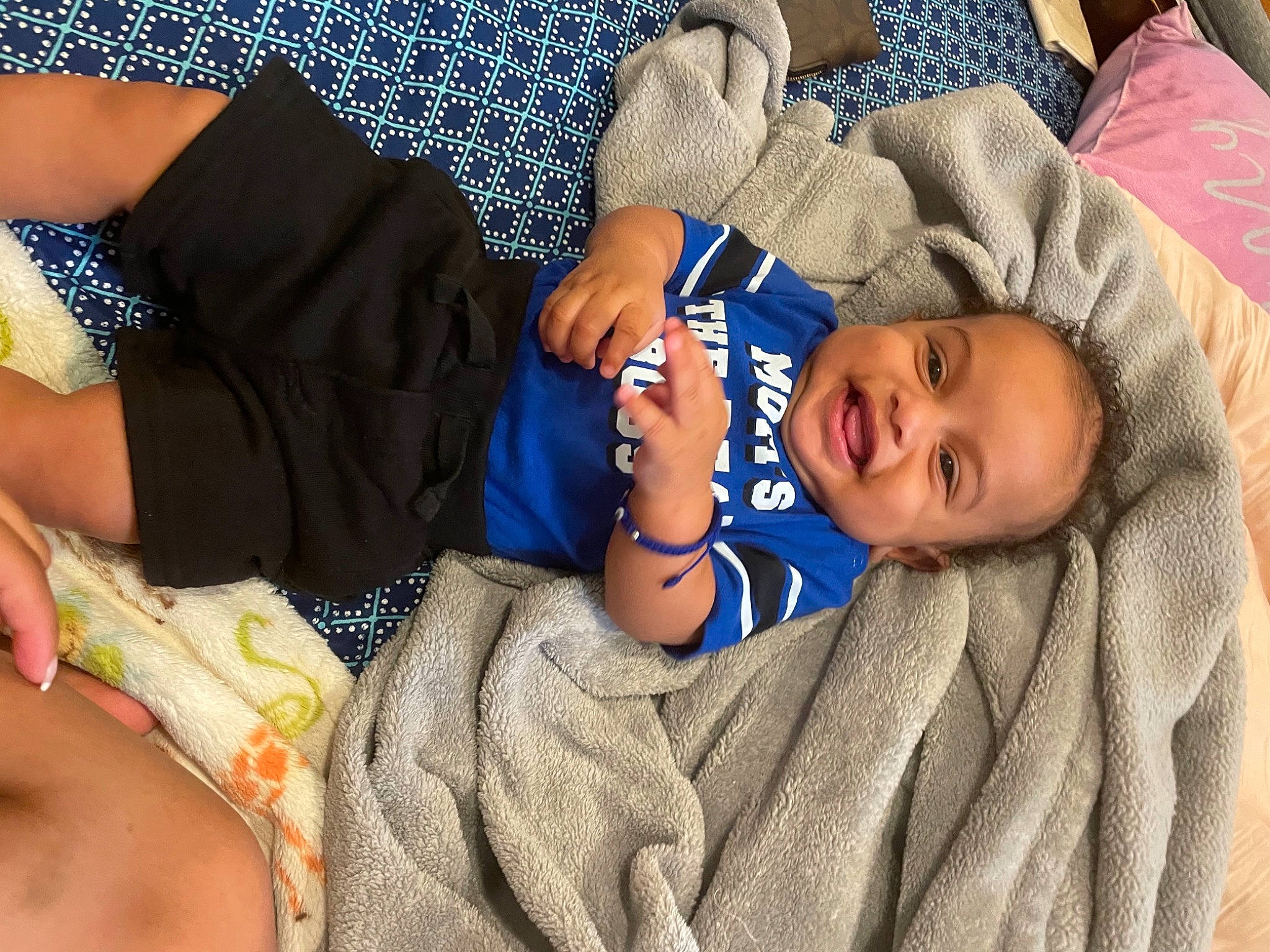 Kyrin is registered to the contest to win money with this photo: arm, baby, baby_toddler_clothing, child, comfort, face, facial_expression, fun, gesture, happy, human_body, joy, mammal, mouth, people, person, product, skin, smile, textile