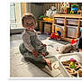 Sharlie a rejoint le concours — aidez-le/la à gagner de superbes lots ! toddler, pacifier, child, toy, plush, indoor, rug, sunlight, furniture, storage, playroom, floor, clothing, baby, smiling, wooden_toys, basket, door, window, happy