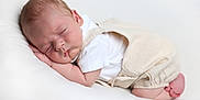 Oakley joined the competition — help win amazing prizes! baby, newborn, sleeping, infant, soft, white, clothing, peaceful, cute, resting, skin, face, hand, foot, cozy, portrait, child, toddler, relaxed, indoors