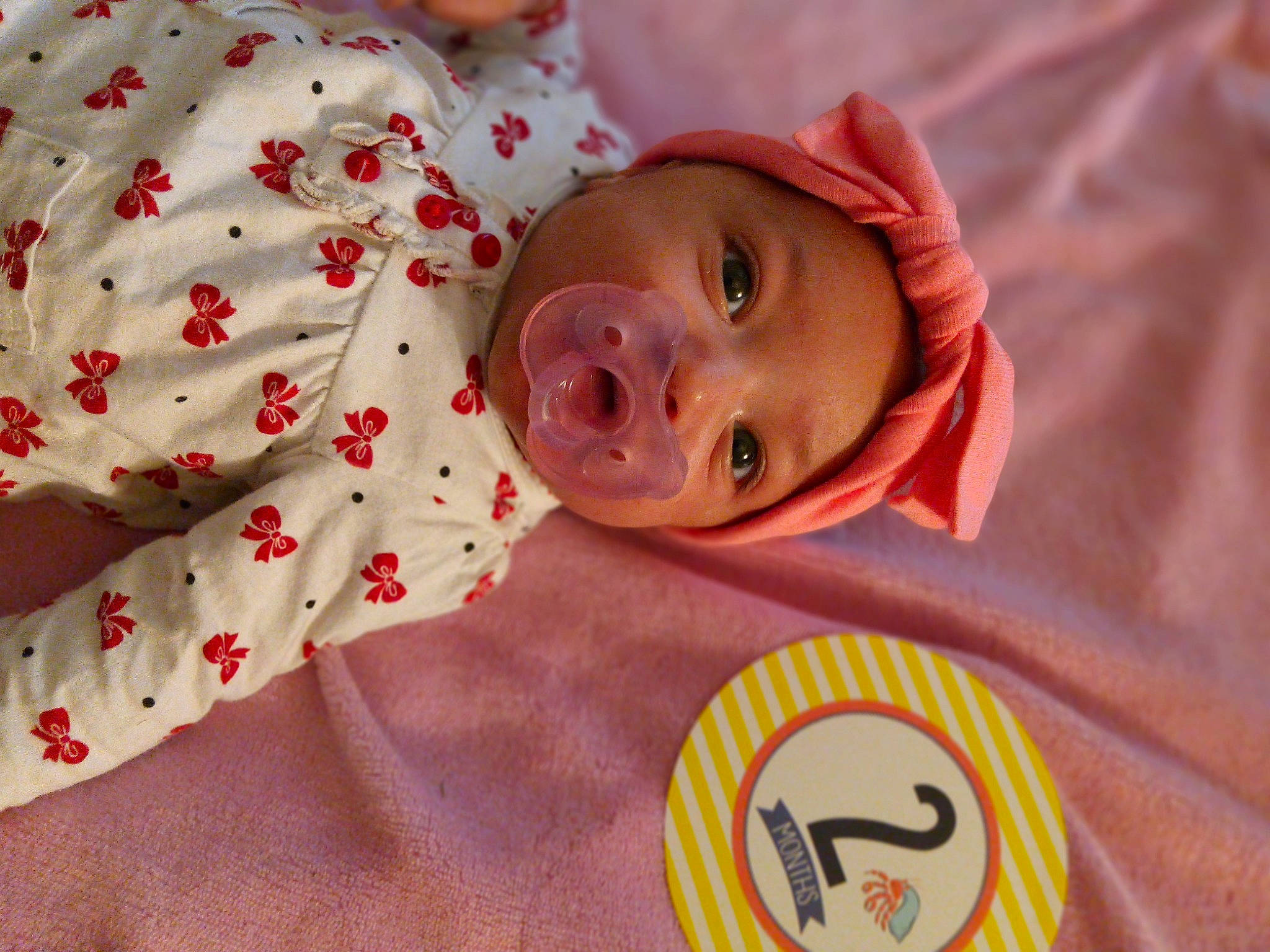 Jada joined the competition — help win amazing prizes! baby, baby_products, baby_safety, baby_sleeping, baby_toddler_clothing, bedding, bedtime, child, comfort, hat, headwear, human_body, linens, logo, nightwear, orange, pattern, person, skin, sleeve