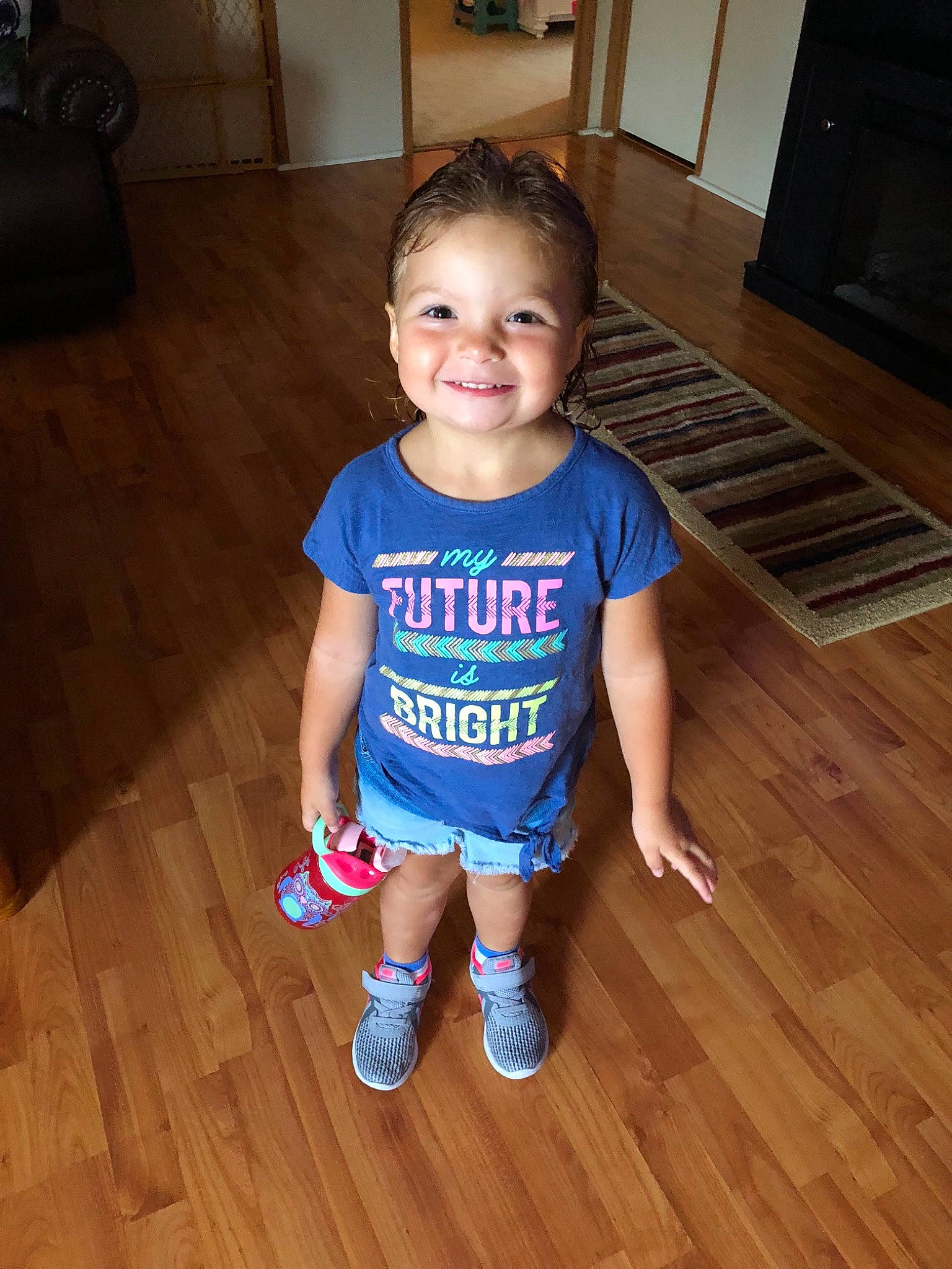 Ayva joined the competition — help win amazing prizes! baby, baby_toddler_clothing, child, finger, floor, flooring, hardwood, joy, leg, person, play, skin, smile, standing, t_shirt, toddler, wood, wood_flooring