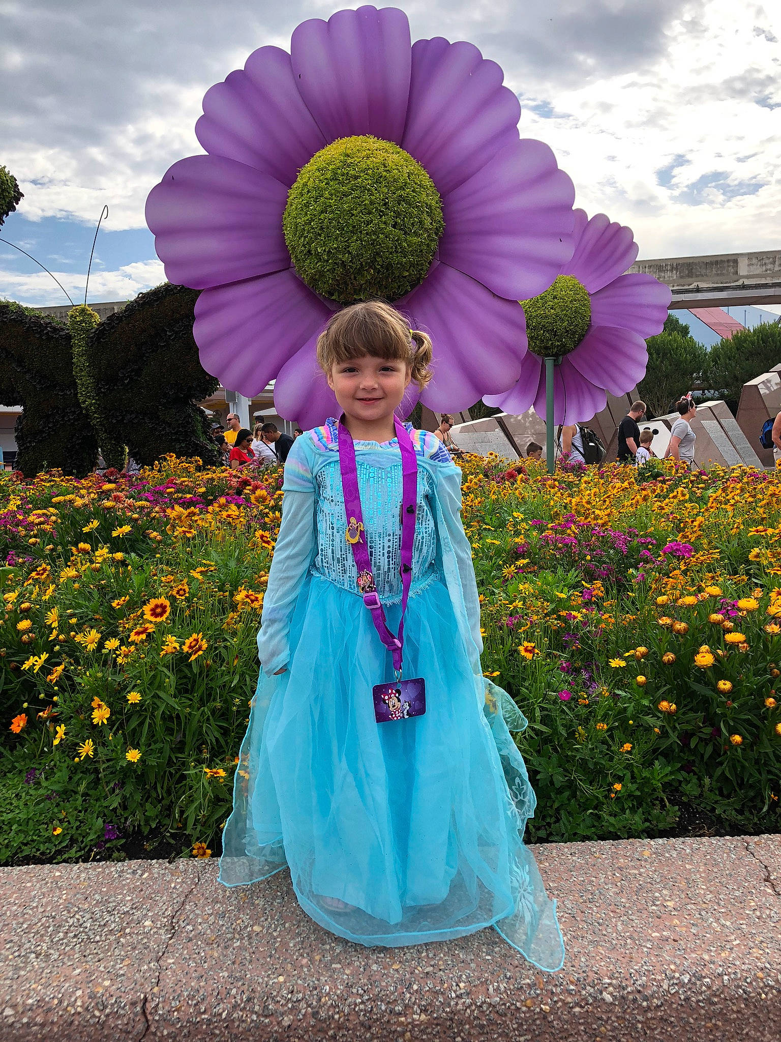 Ayva is registered to the contest to win money with this photo: architecture, beauty, blue, botany, dress, eye, flower, garden, joy, lady, outerwear, person, petal, photography, pink, plant, purple, spring, sunflower, violet