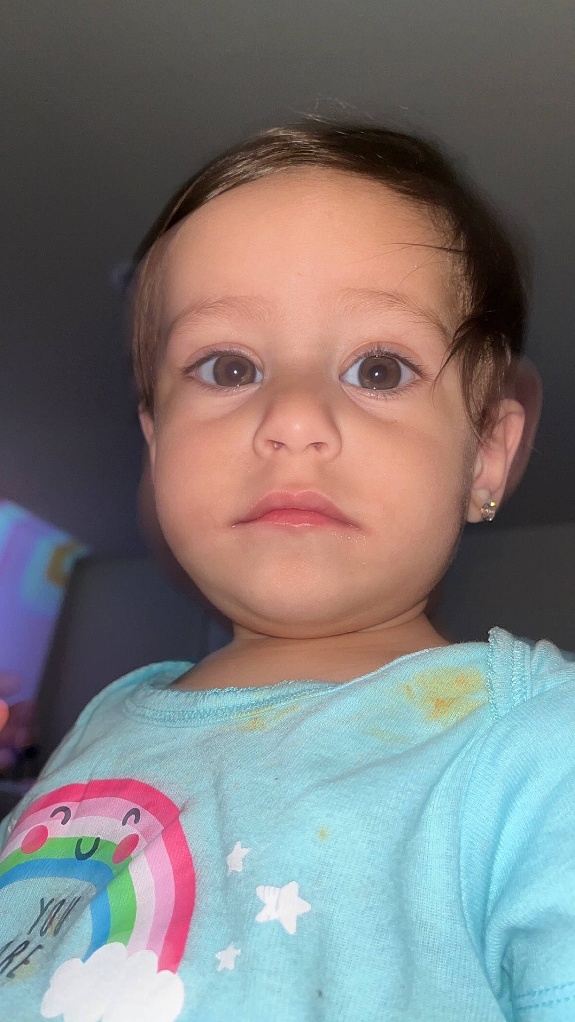 Aryana is registered to the contest to win money with this photo: baby_toddler_clothing, cheek, chin, ear, eye, eyebrow, eyelash, facial_expression, forehead, hairstyle, head, iris, lip, mouth, neck, nose, person, pink, skin, sleeve