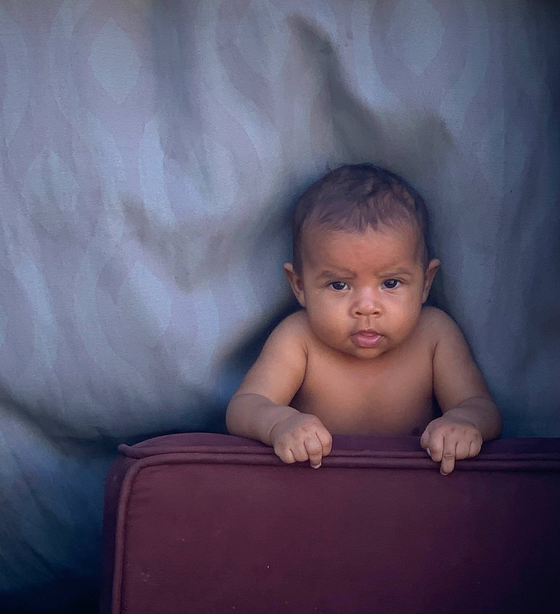 Alannah is registered to the contest to win money with this photo: baby, cheek, child, eye, face, furniture, hand, head, lip, nose, person, photography, portrait, portrait_photography, sitting, skin, smile, toddler