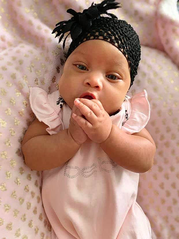 Aabree Louise is registered to the contest to win money with this photo: baby, black_hair, cheek, child, child_model, fashion_accessory, hair_accessory, headband, headgear, headpiece, nose, person, skin, toddler