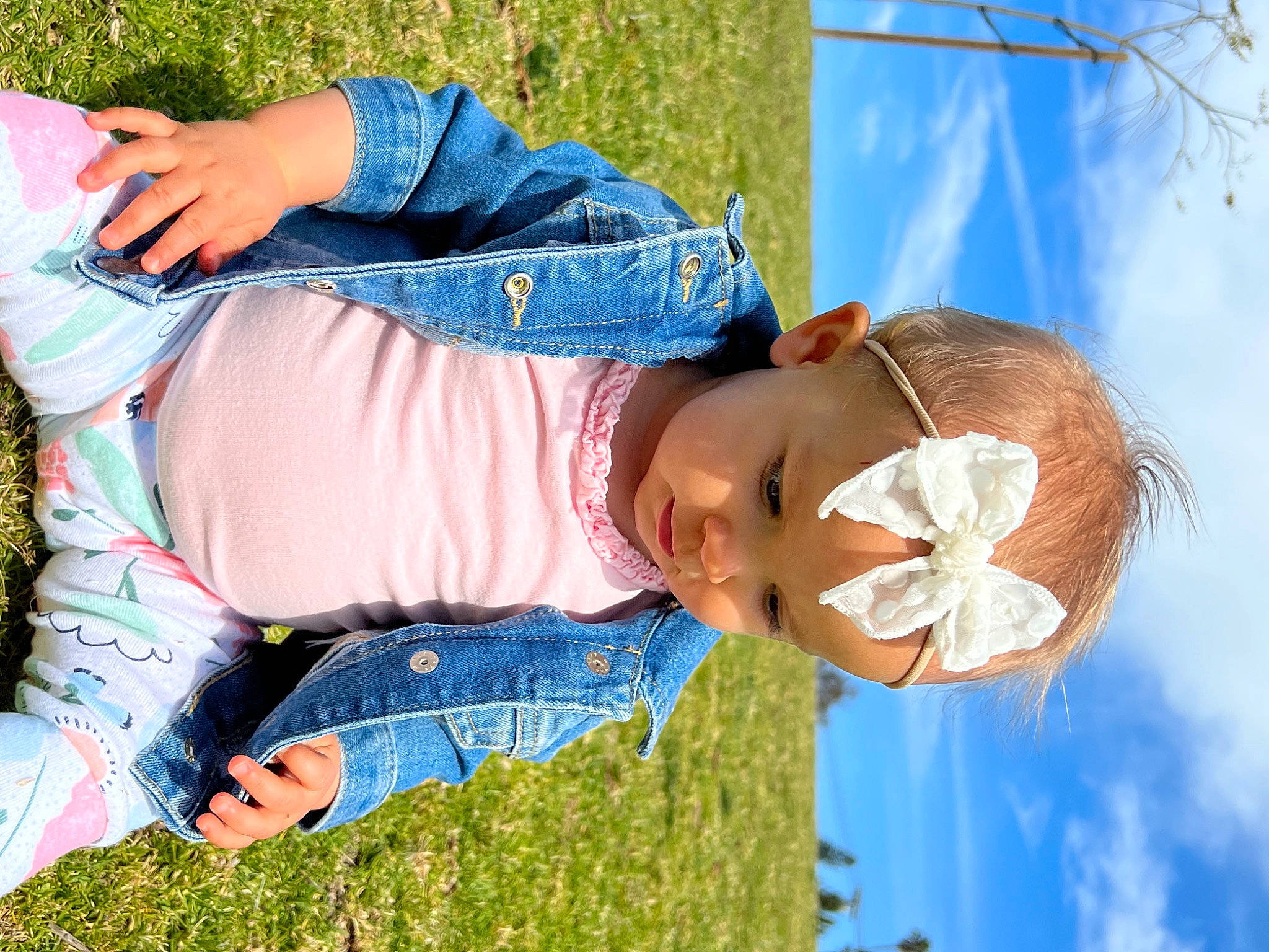 Liberty is registered to the contest to win money with this photo: blue, child, cloud, denim, eyewear, fun, gesture, grass, happy, jeans, leaf, leisure, people_in_nature, person, plant, red, sky, spring, toddler, tree