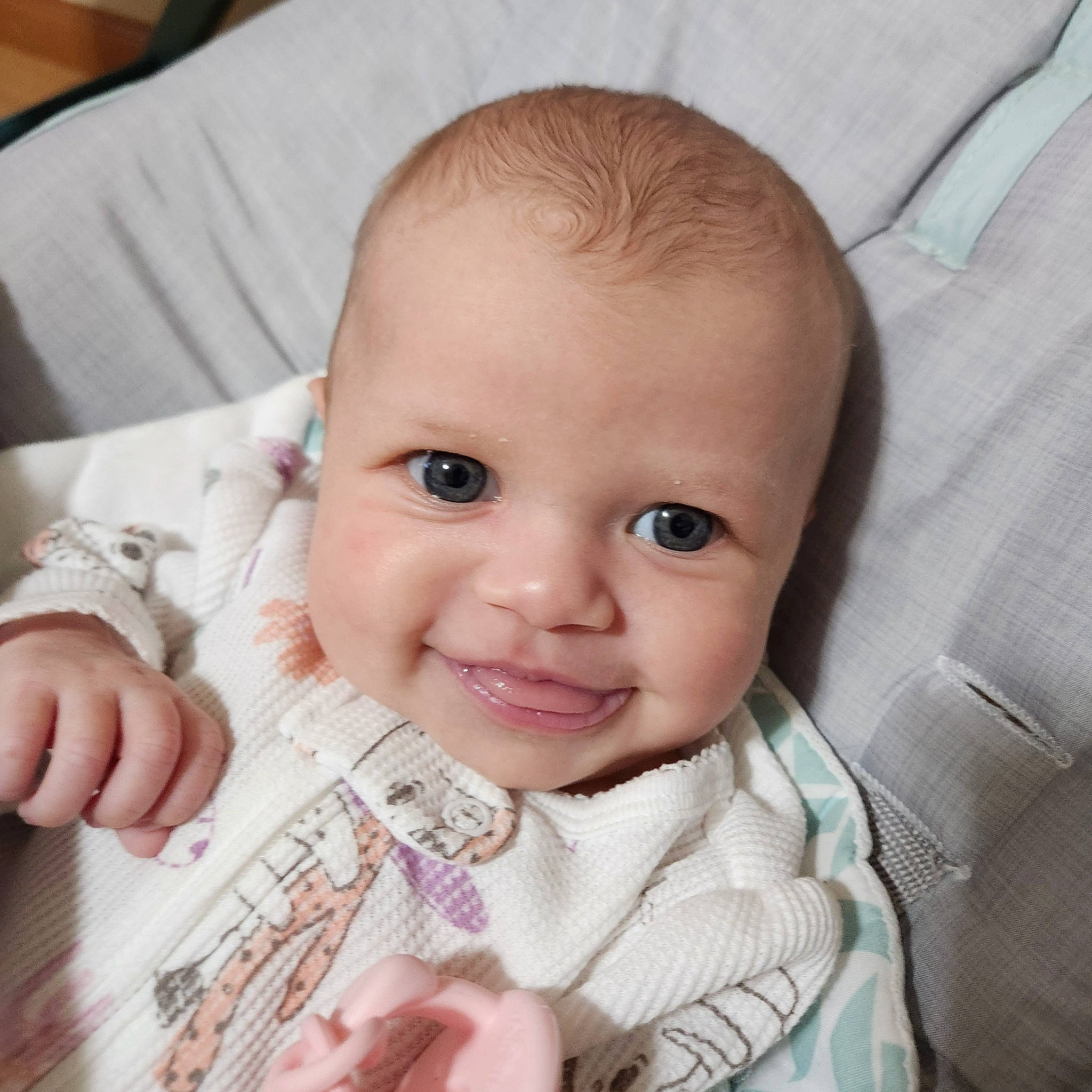 Kora is registered to the contest to win money with this photo: baby, baby_toddler_clothing, cheek, child, comfort, cool, ear, eyelash, finger, gesture, happy, iris, nail, nose, organ, person, skin, sleeve, smile, thumb