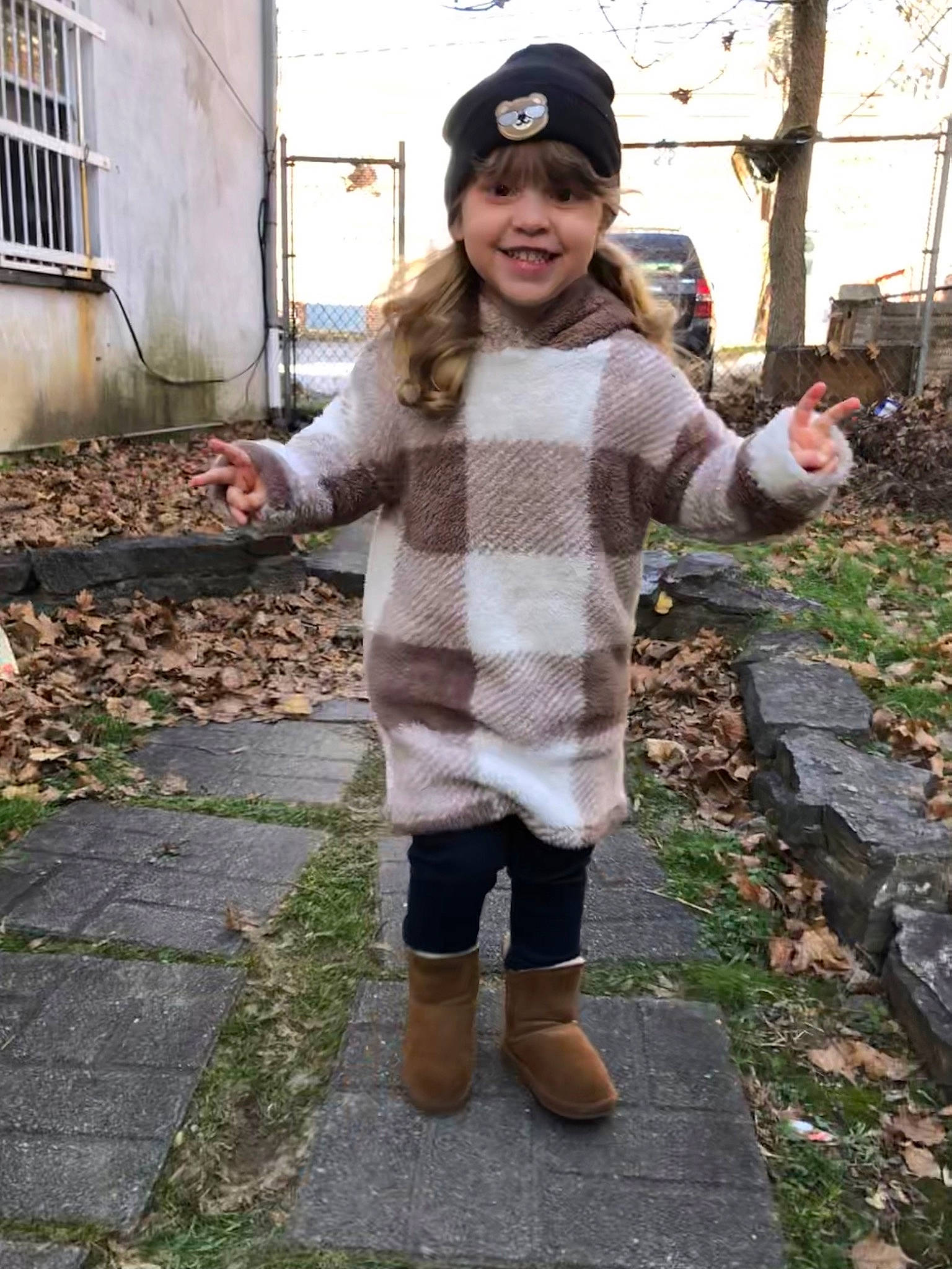 Lucy is registered to the contest to win money with this photo: cap, child, denim, eyewear, fashion_accessory, fun, fur, grass, headgear, headwear, joy, leisure, pattern, person, plaid, plant, sleeve, smile, snapshot, toddler