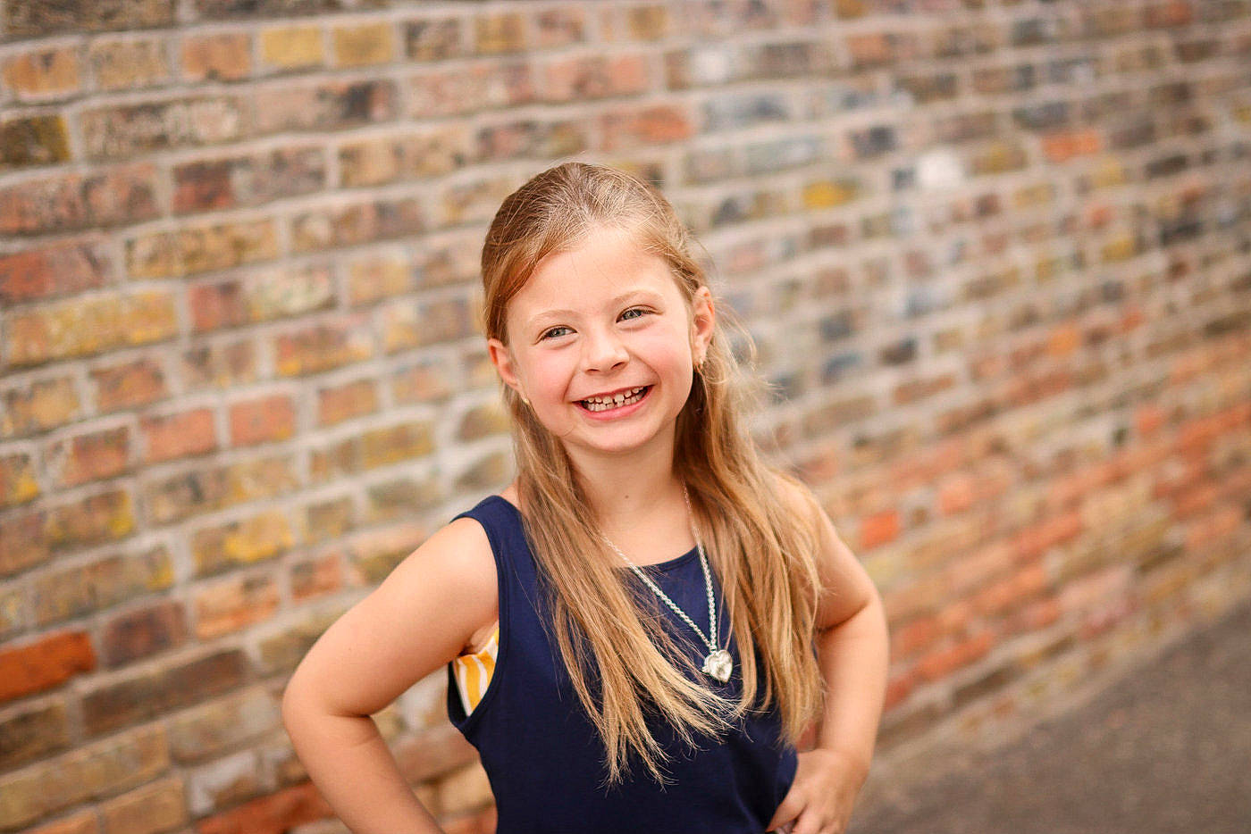 Mckinsley joined the competition — help win amazing prizes! blond, brick, brickwork, brown_hair, electric_blue, face, flash_photography, fun, grass, happy, jewellery, joy, leisure, long_hair, people_in_nature, person, sitting, sleeveless_shirt, smile, street_fashion