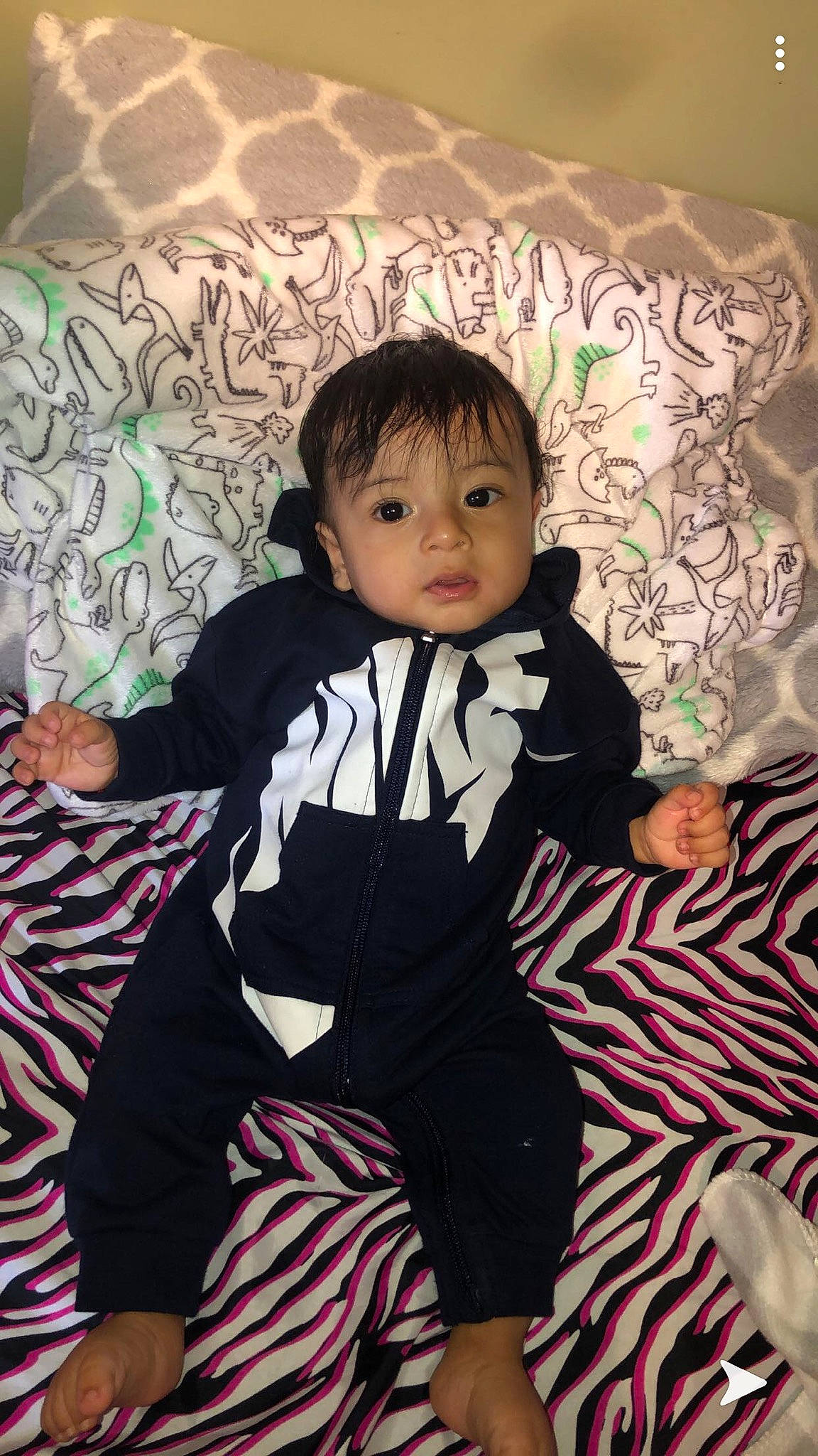 Adan is registered to the contest to win money with this photo: baby, child, cool, outerwear, person, skin, t_shirt, toddler