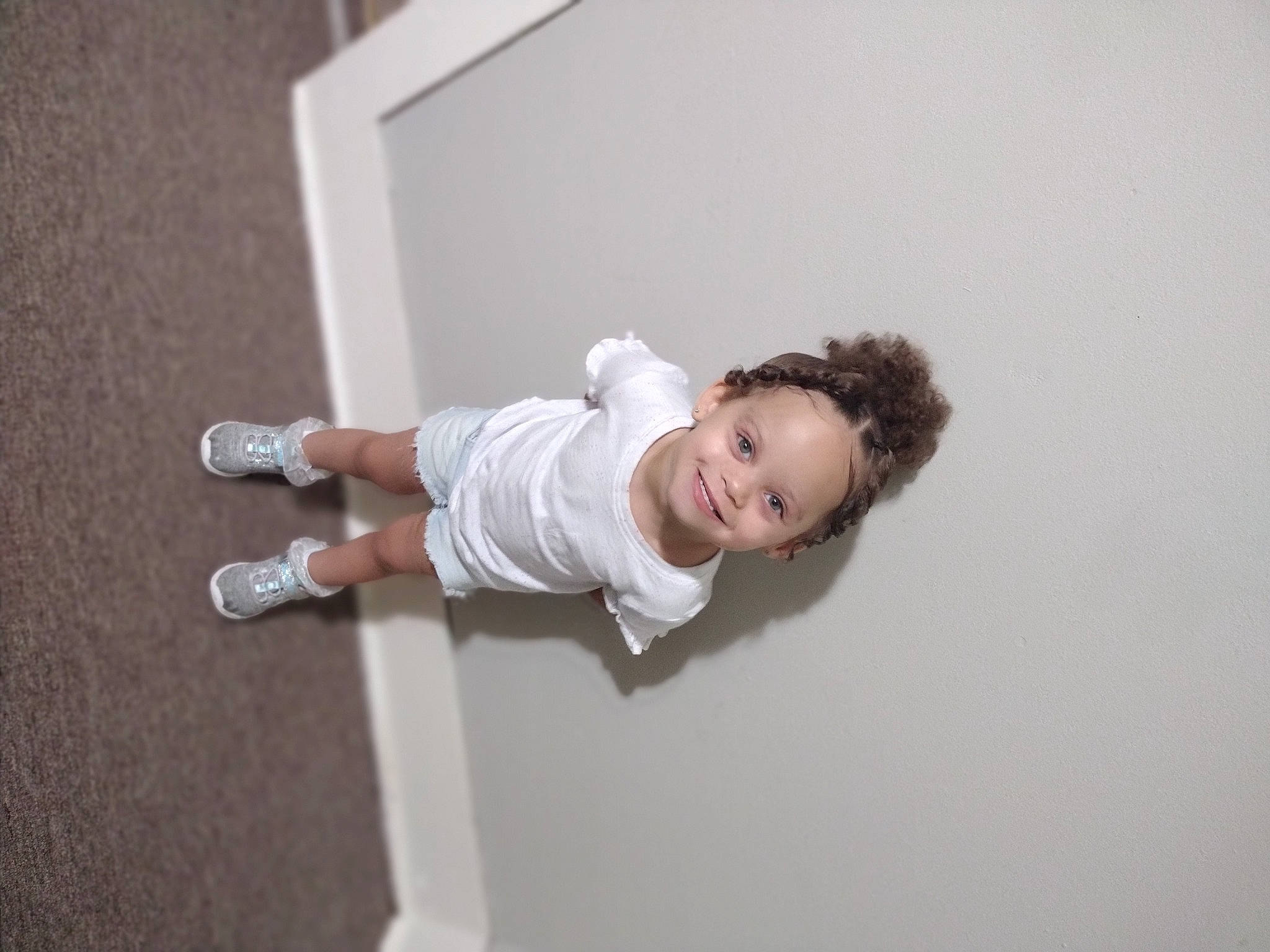 Winter is registered to the contest to win money with this photo: baby, ceiling, child, elbow, flash_photography, flooring, hardwood, human_leg, joy, knee, person, room, sleeve, toddler, wood, wrist