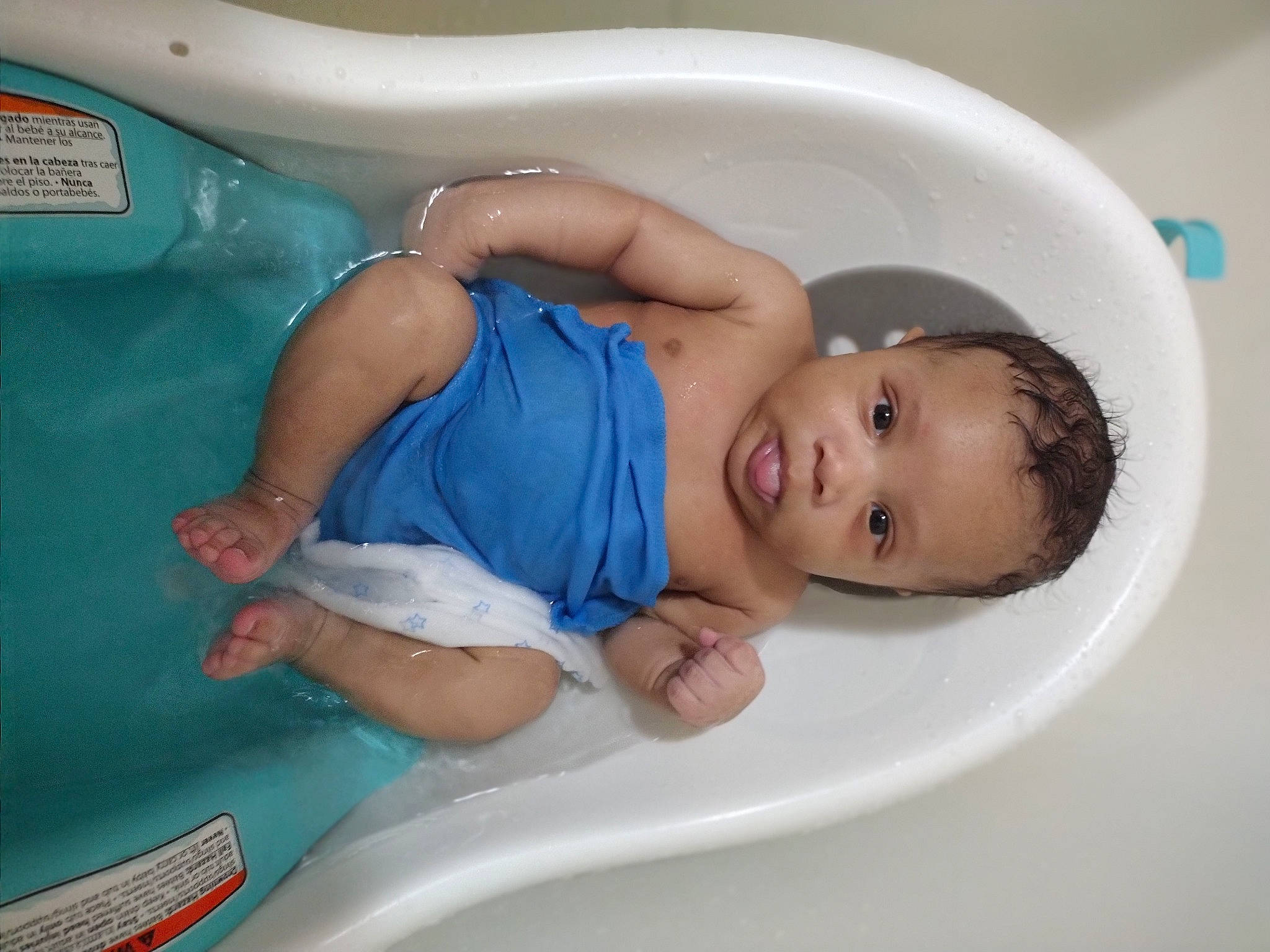 Trenton Jr is registered to the contest to win money with this photo: baby, baby_bathing, baby_products, bath_toy, bathing, bathroom, bathtub, chest, child, comfort, elbow, fluid, fun, leisure, person, personal_care, plumbing, plumbing_fixture, room, toddler