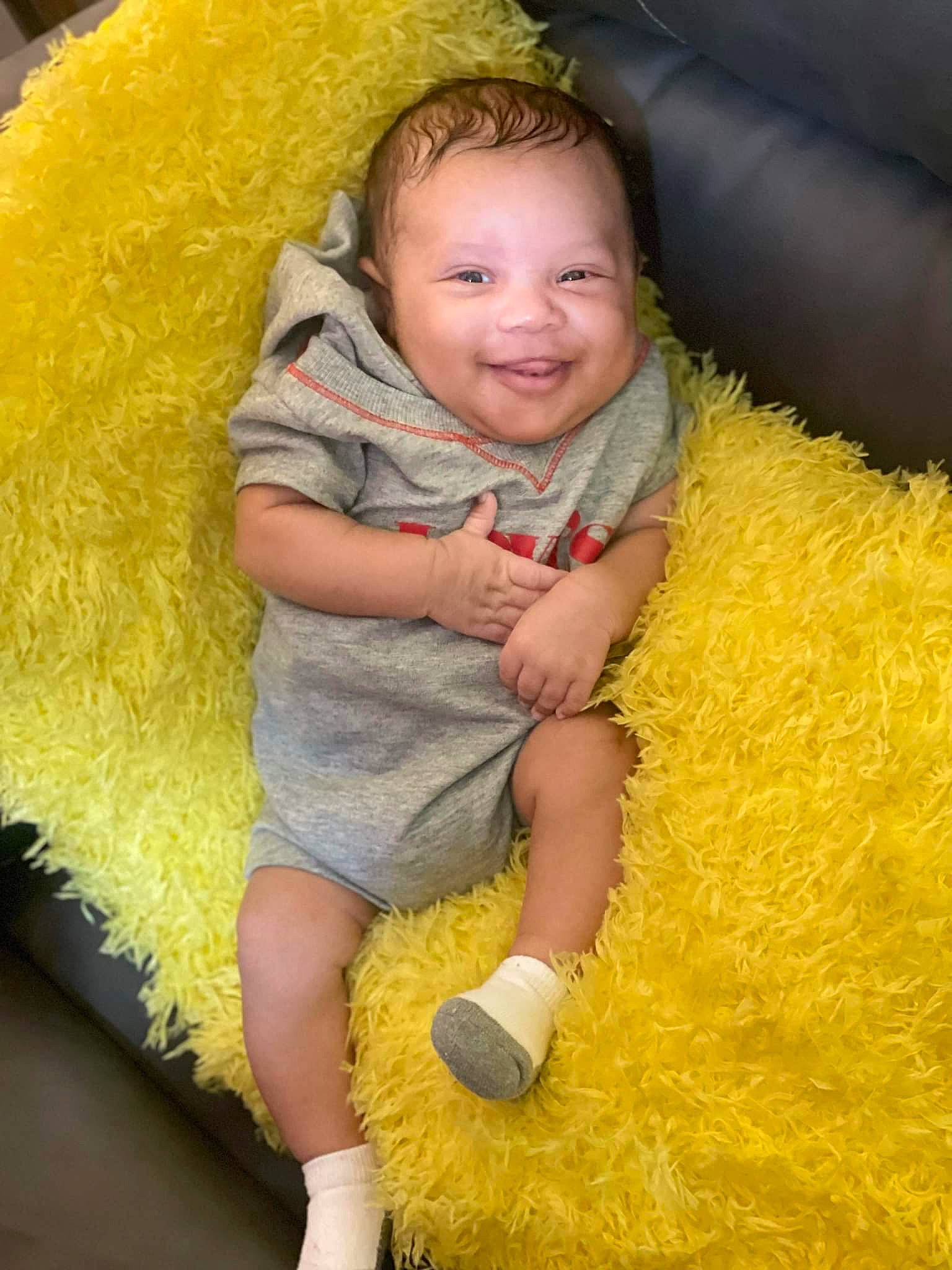 Trenton Jr is registered to the contest to win money with this photo: baby, baby_toddler_clothing, cheek, eye, facial_expression, finger, fun, grass, happy, head, joy, orange, organ, people_in_nature, person, photograph, pink, skin, smile, textile