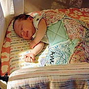 Amelia joined the competition — help win amazing prizes! baby, sleeping, quilt, blanket, bassinet, infant, resting, child, cozy, bed, sleep, comfort, soft, peaceful, indoor, person, cute, young, covering, cushion
