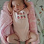 Kaylee is registered to the contest to win money with this photo: baby, sleeping, infant, onesie, pink_blanket, floral_bed, peaceful, cute, newborn, arms_up, legs_bent, soft_lighting, indoors, face, skin, foot, head, pattern, fabric, resting