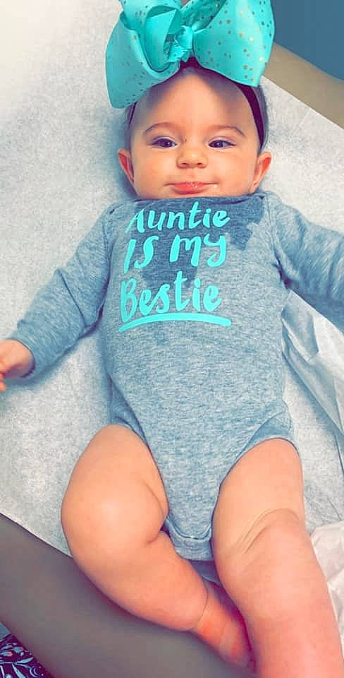 Rylynn joined the competition — help win amazing prizes! baby, baby_products, baby_toddler_clothing, blue, cheek, child, cool, headgear, infant_bodysuit, leg, outerwear, person, product, skin, sleeve, t_shirt, thigh, toddler, turquoise