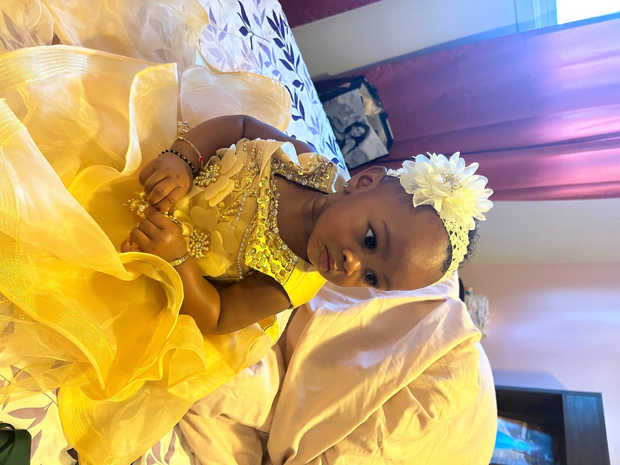 Sariyah joined the competition — help win amazing prizes! baby, child, costume, curtain, dress, entertainment, event, fashion_design, fun, happy, hat, headpiece, jewellery, person, plant, room, toddler, tradition