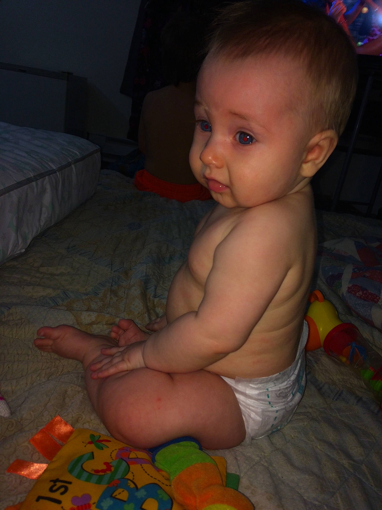 Kobe is registered to the contest to win money with this photo: arm, boy, cheek, child, eye, face, finger, fun, girl, hand, head, human_hair_color, infant, leg, mouth, muscle, person, sitting, skin, toddler