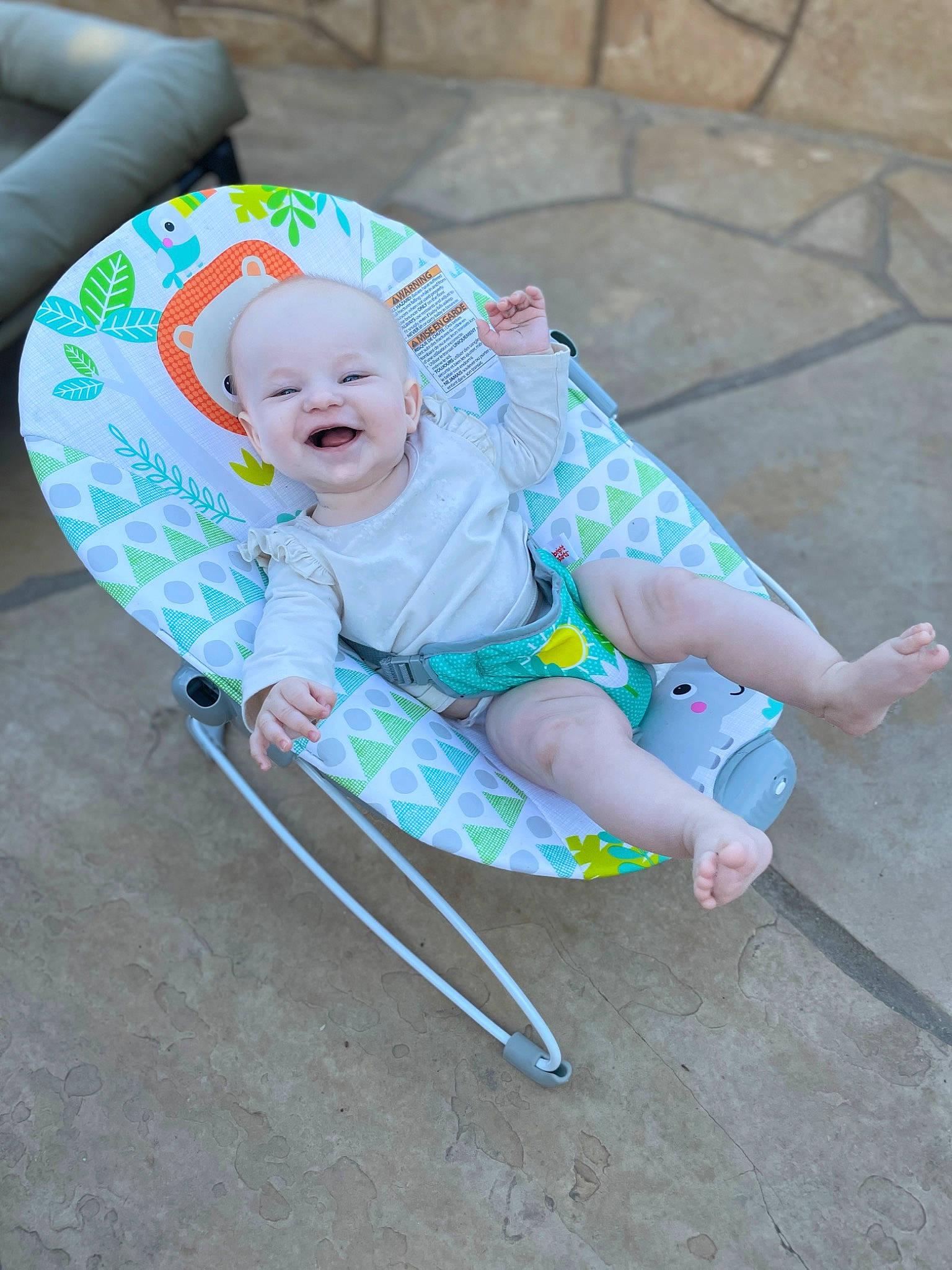 Aria is registered to the contest to win money with this photo: baby, baby_products, baby_toddler_clothing, child, comfort, concrete, fun, grass, happy, hat, leisure, magenta, person, play, recreation, shorts, sitting, sleeve, smile, t_shirt