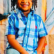Brendan joined the competition — help win amazing prizes! child, boy, smiling, braided_hair, blue_shirt, jeans, autumn_leaves, pumpkin, rustic_background, fall, festive, portrait, posing, happy, indoors, colorful, casual_clothing, cute, seasonal, decoration