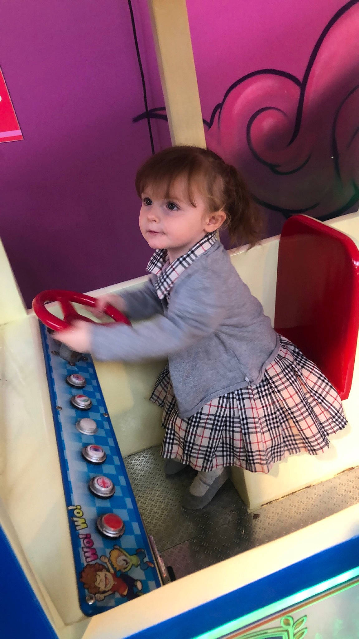 Mila participe au concours pour gagner de l'argent avec cette photo : baby, baby_toddler_clothing, beauty, chair, child, design, fashion, fun, happy, leisure, magenta, pattern, person, pink, plaid, play, purple, sitting, tartan, textile