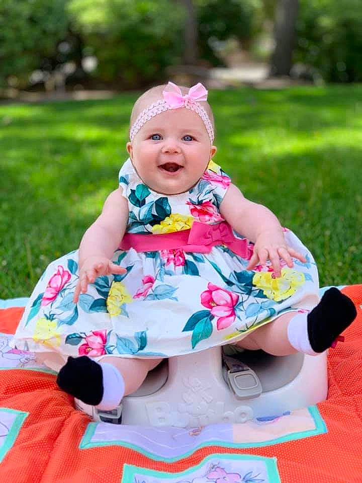 Lily Rose is registered to the contest to win money with this photo: baby, baby_products, baby_toddler_clothing, child, leisure, person, pink, play, product, sitting, toddler