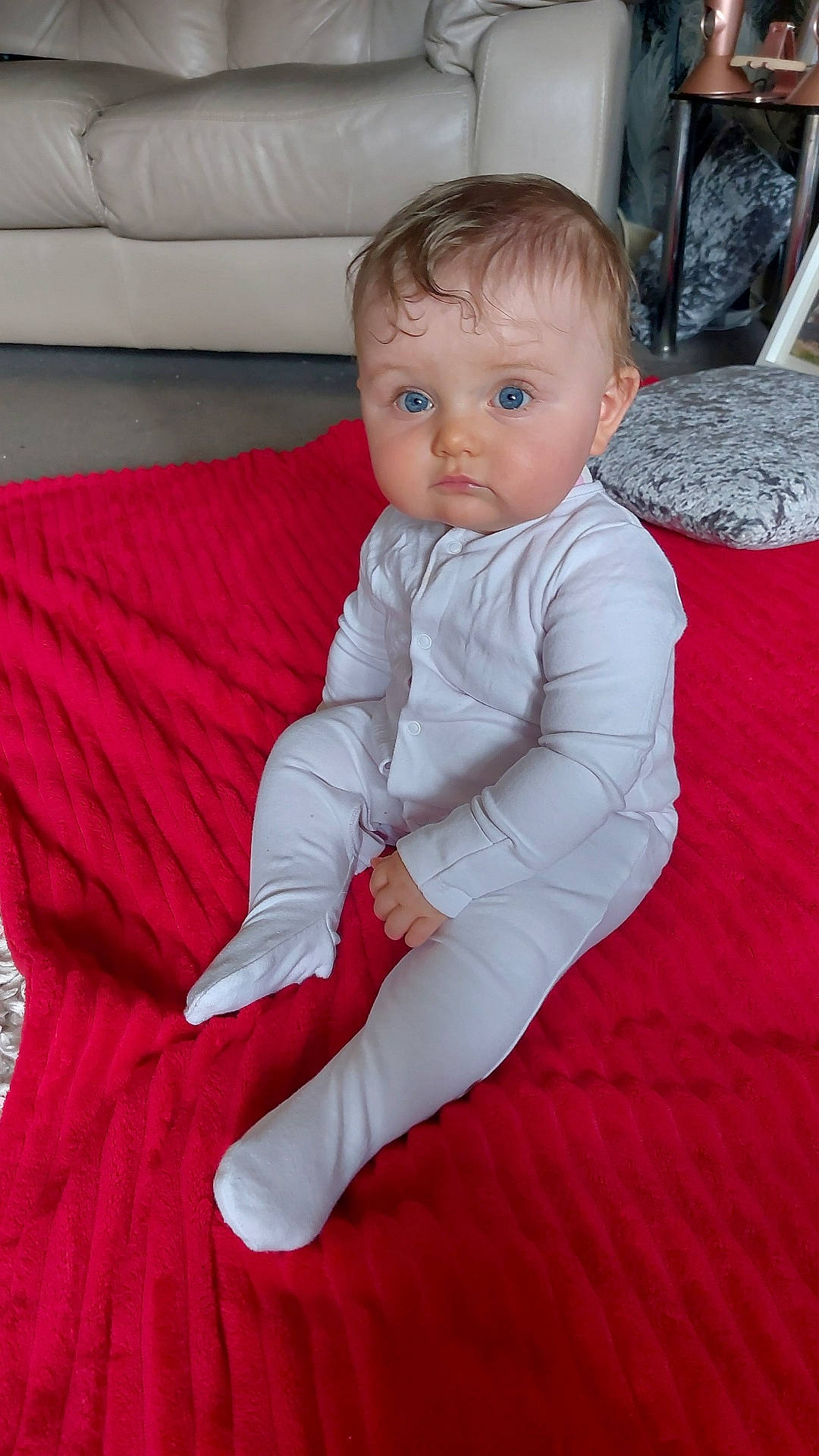 Layla joined the competition — help win amazing prizes! architecture, baby, blanket, bodypart, building, couch, cushion, face, finger, furniture, hand, head, homedecor, indoors, livingroom, person, photography, portrait, room, sitting