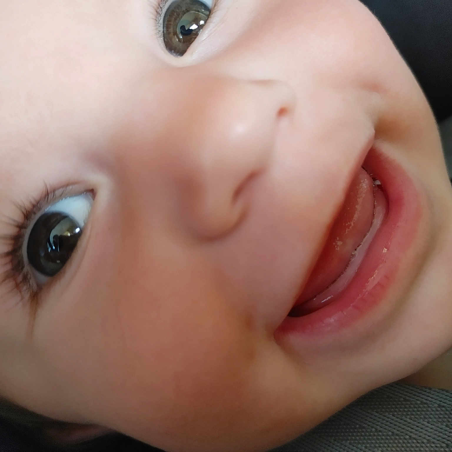 J J is registered to the contest to win money with this photo: cheek, chin, ear, eye, eyebrow, eyelash, face, facial_expression, finger, forehead, gesture, happy, iris, lip, mouth, nose, organ, skin, smile, toddler