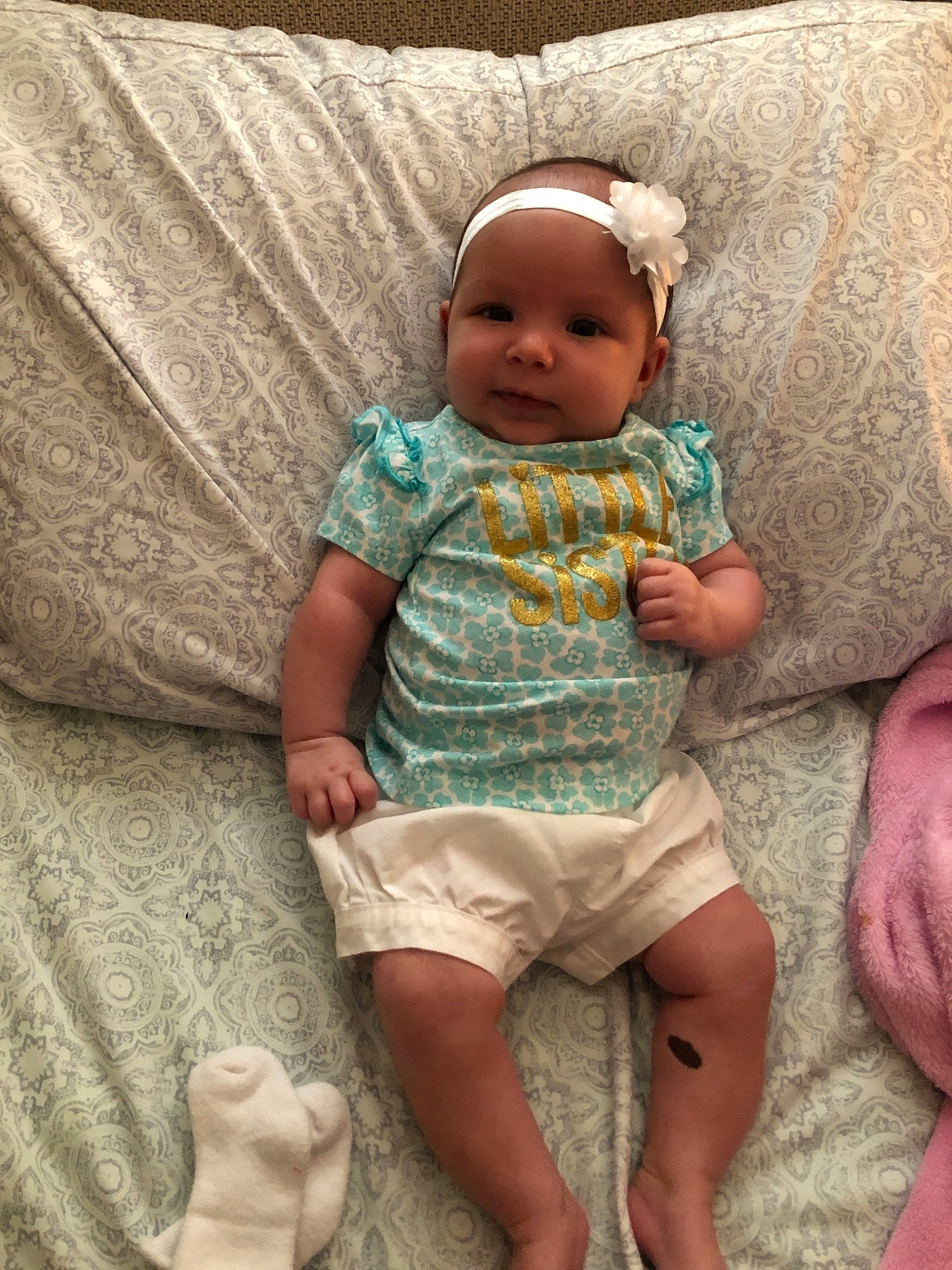 Kaylie is registered to the contest to win money with this photo: baby, baby_products, child, head, linens, person, sitting, skin, toddler