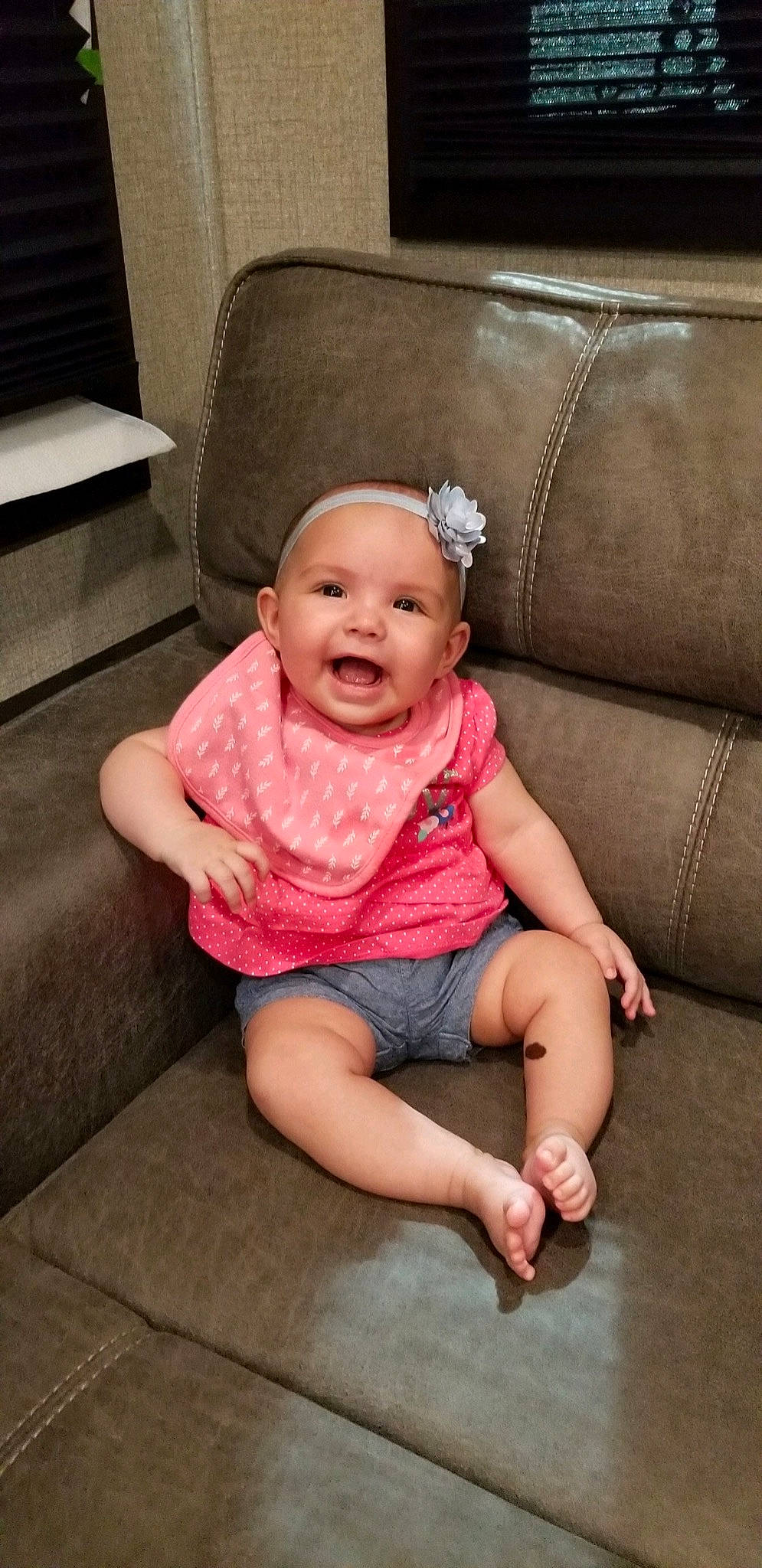 Kaylie joined the competition — help win amazing prizes! arm, baby, chair, cheek, child, couch, finger, furniture, leg, person, pink, sitting, skin, smile, toddler