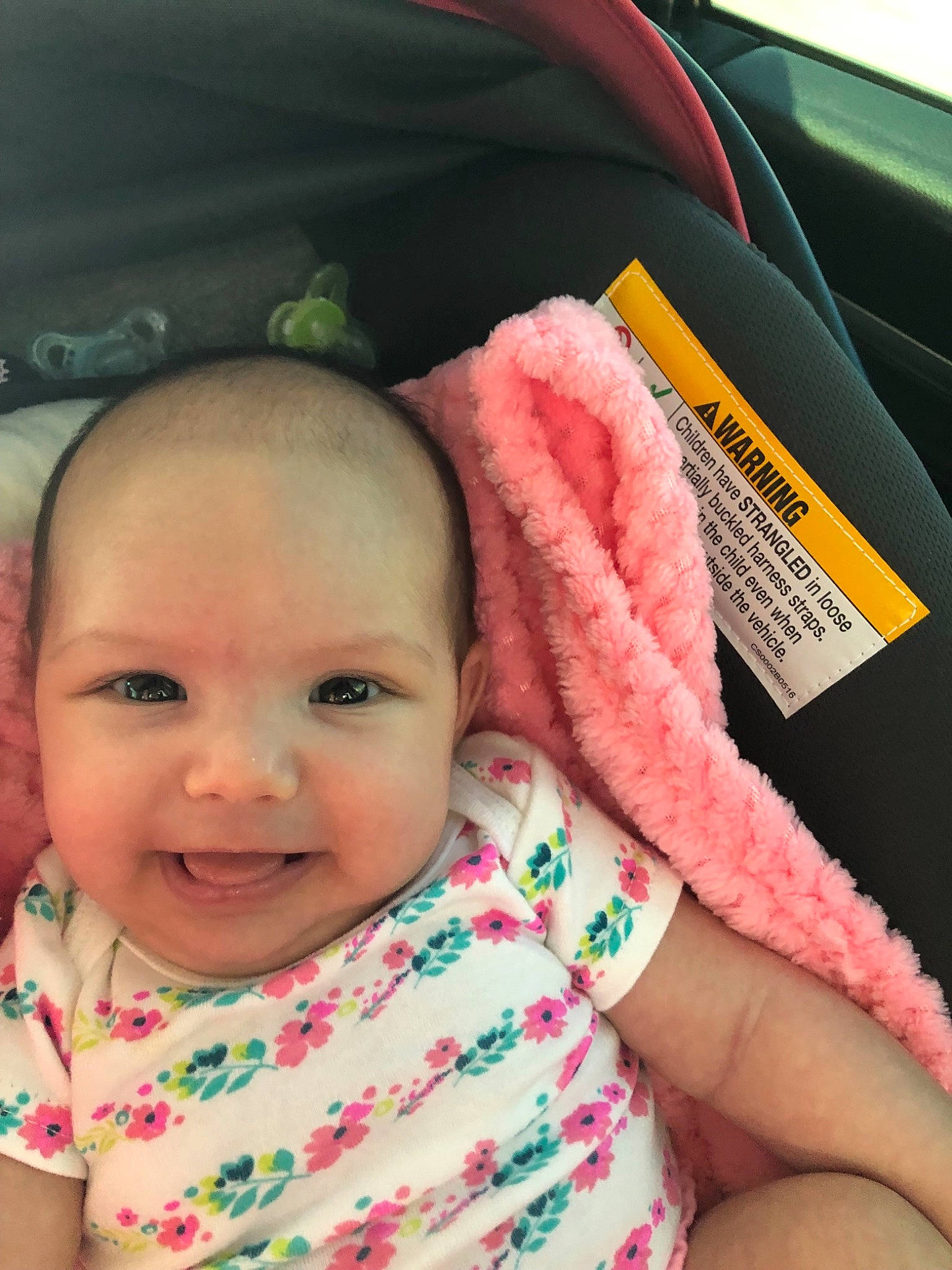 Kaylie is registered to the contest to win money with this photo: baby, baby_in_car_seat, baby_products, birth, car_seat, cheek, child, cool, ear, face, head, lip, nose, person, pink, skin, smile, textile, toddler