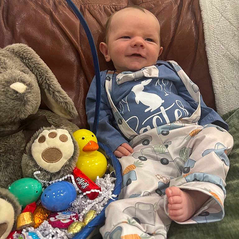 Malachi joined the competition — help win amazing prizes! baby, basket, blanket, celebration, child, chocolate, clothing, couch, cute, easter_eggs, foot, indoor, infant, leather, plush_bunny, portrait, relaxed, rubber_duck, smiling, toy