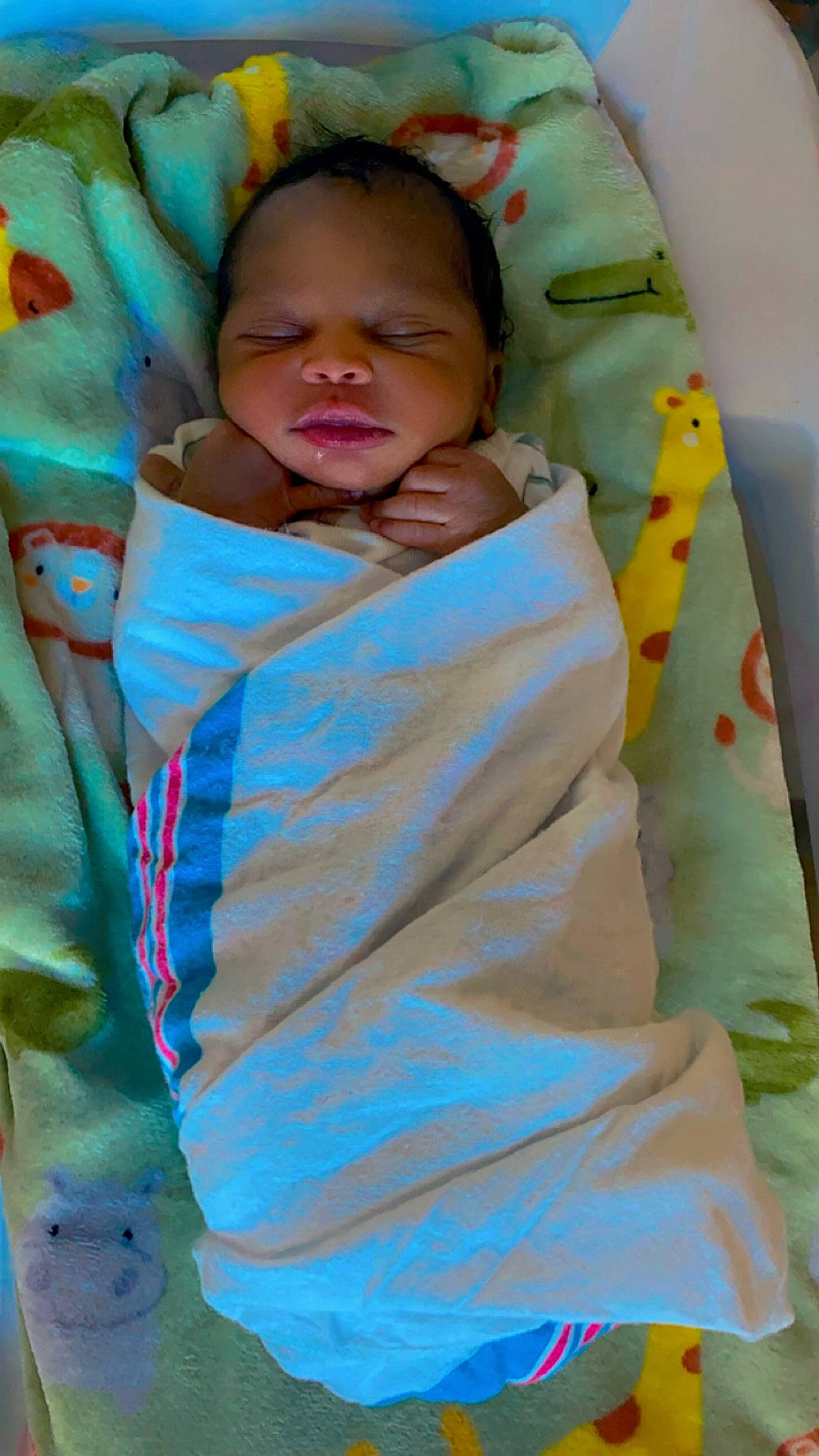 Hezekiah joined the competition — help win amazing prizes! baby, baby_products, baby_safety, baby_sleeping, baby_toddler_clothing, bedtime, cheek, child, collar, comfort, electric_blue, face, happy, linens, pattern, person, skin, sleep, sleeve, textile