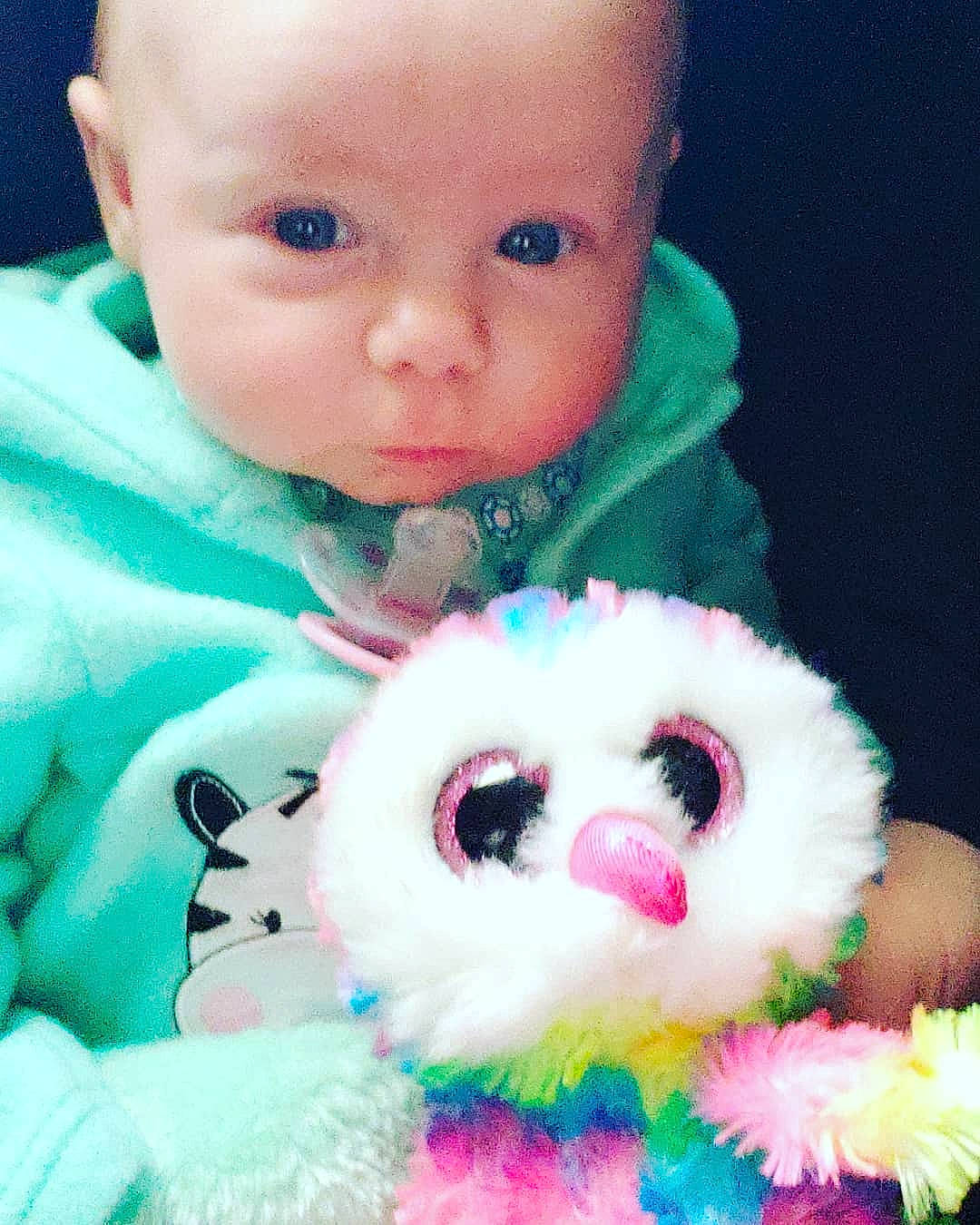 Jacey is registered to the contest to win money with this photo: baby, cheek, child, ear, eye, face, fur, happy, head, iris, lip, nose, person, pink, play, skin, smile, stuffed_toy, teddy_bear, toddler
