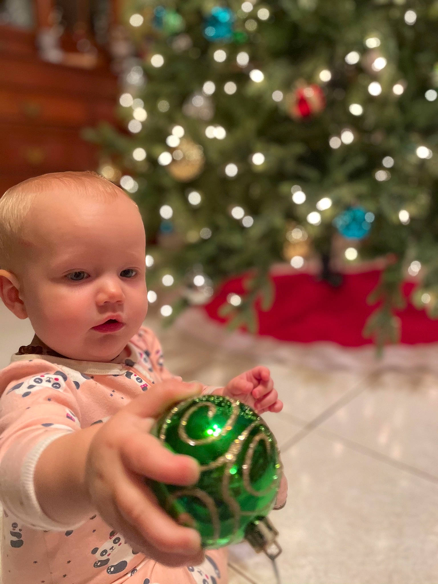 Avery is registered to the contest to win money with this photo: abdomen, baby, christmas, christmas_decoration, christmas_eve, christmas_lights, christmas_ornament, christmas_tree, conifer, festival, fir, holiday, holiday_ornament, interior_design, ornament, person, pine, pine_family, toy, trunk