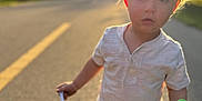 Ilias joined the competition — help win amazing prizes! child, toddler, road, sunlight, bubble_solution, bubble_wand, shorts, shirt, shoes, outdoor, summer, daylight, sunflare, portrait, playing, young_child, casual_clothing, nature, greenery, sidewalk