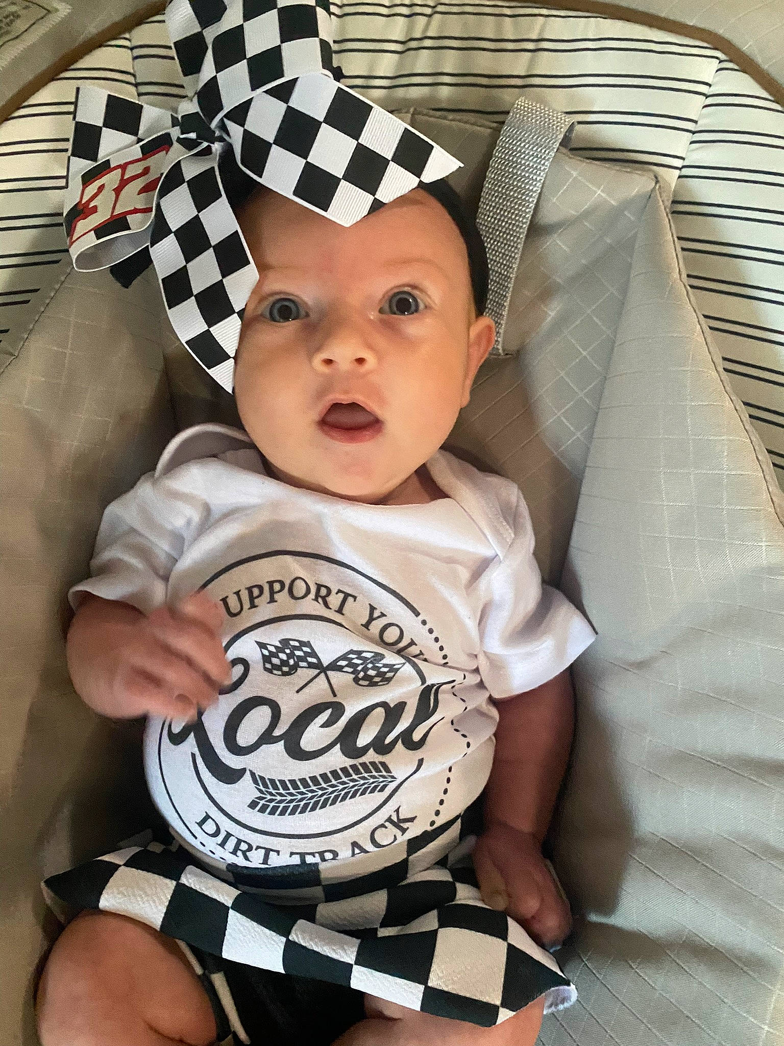 Braylee joined the competition — help win amazing prizes! baby, baby_carriage, baby_safety, baby_toddler_clothing, cap, cheek, child, chin, comfort, cool, eye, face, hairstyle, happy, head, headwear, outerwear, person, sleeve, t_shirt
