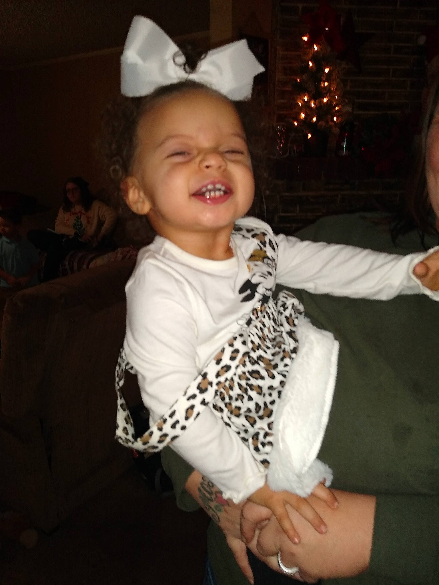 Adalaya is registered to the contest to win money with this photo: baby, baby_toddler_clothing, child, christmas, christmas_eve, christmas_lights, costume, costume_accessory, costume_hat, fictional_character, finger, gesture, hair_accessory, hand, headpiece, holiday, human, party_supply, person, thumb