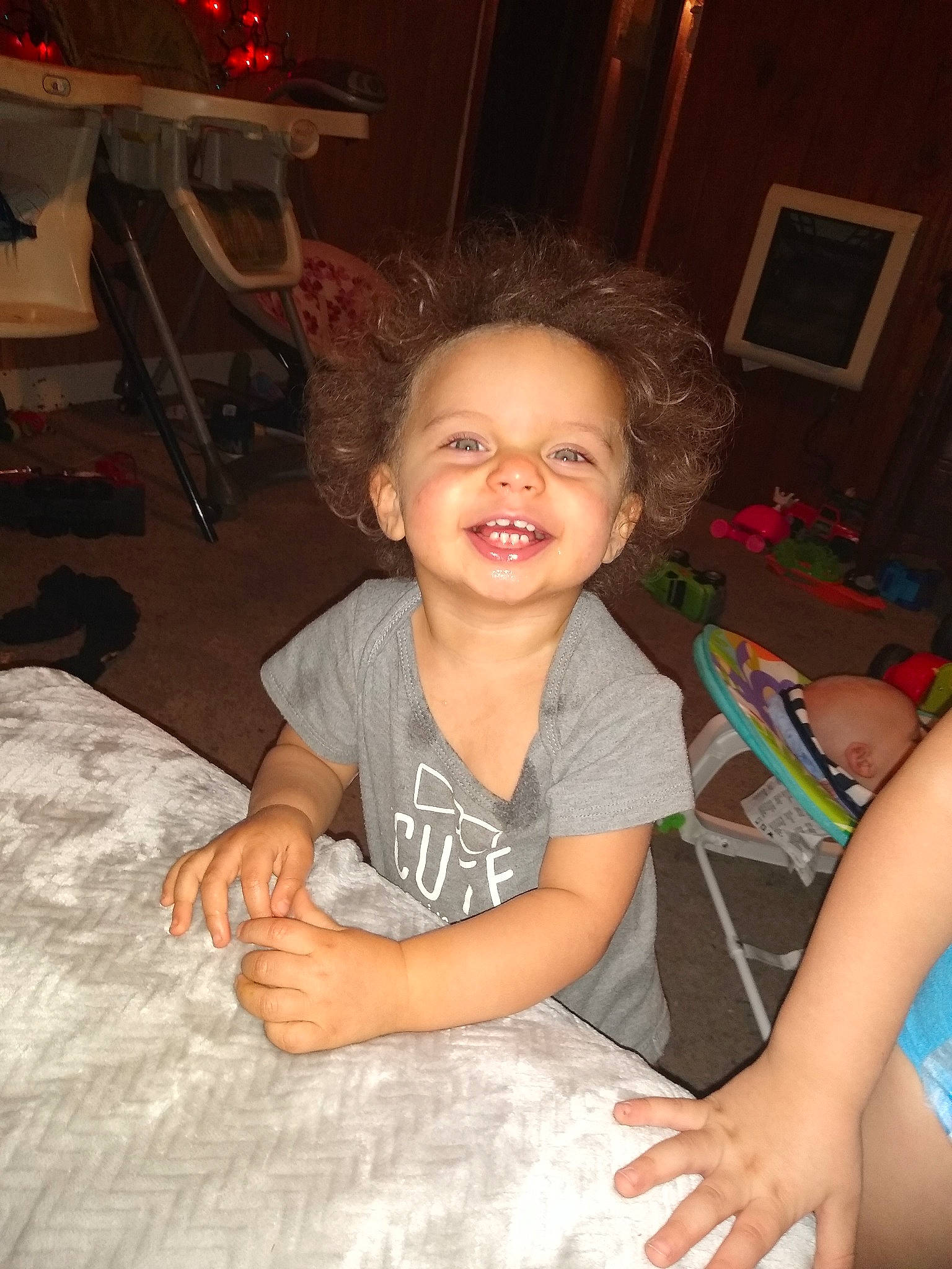 Adalaya is registered to the contest to win money with this photo: baby_toddler_clothing, child, christmas_eve, eye, finger, hand, happy, home, iris, joy, lap, laugh, living_room, mouth, nail, person, picture_frame, room, thumb, toddler