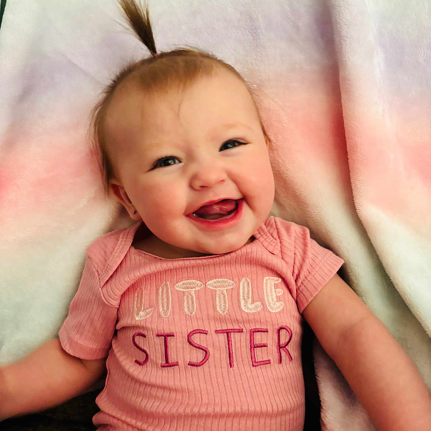 Luna is registered to the contest to win money with this photo: baby, babylaughing, clothing, face, happy, head, laughing, newborn, person, photography, portrait, smile, t_shirt