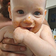 Quentinn joined the competition — help win amazing prizes! adult, baby, child, closeup, cute, diaper, expression, face, food, hand, happy, holding, home, indoor, messy, parent, person, portrait, skin, smile