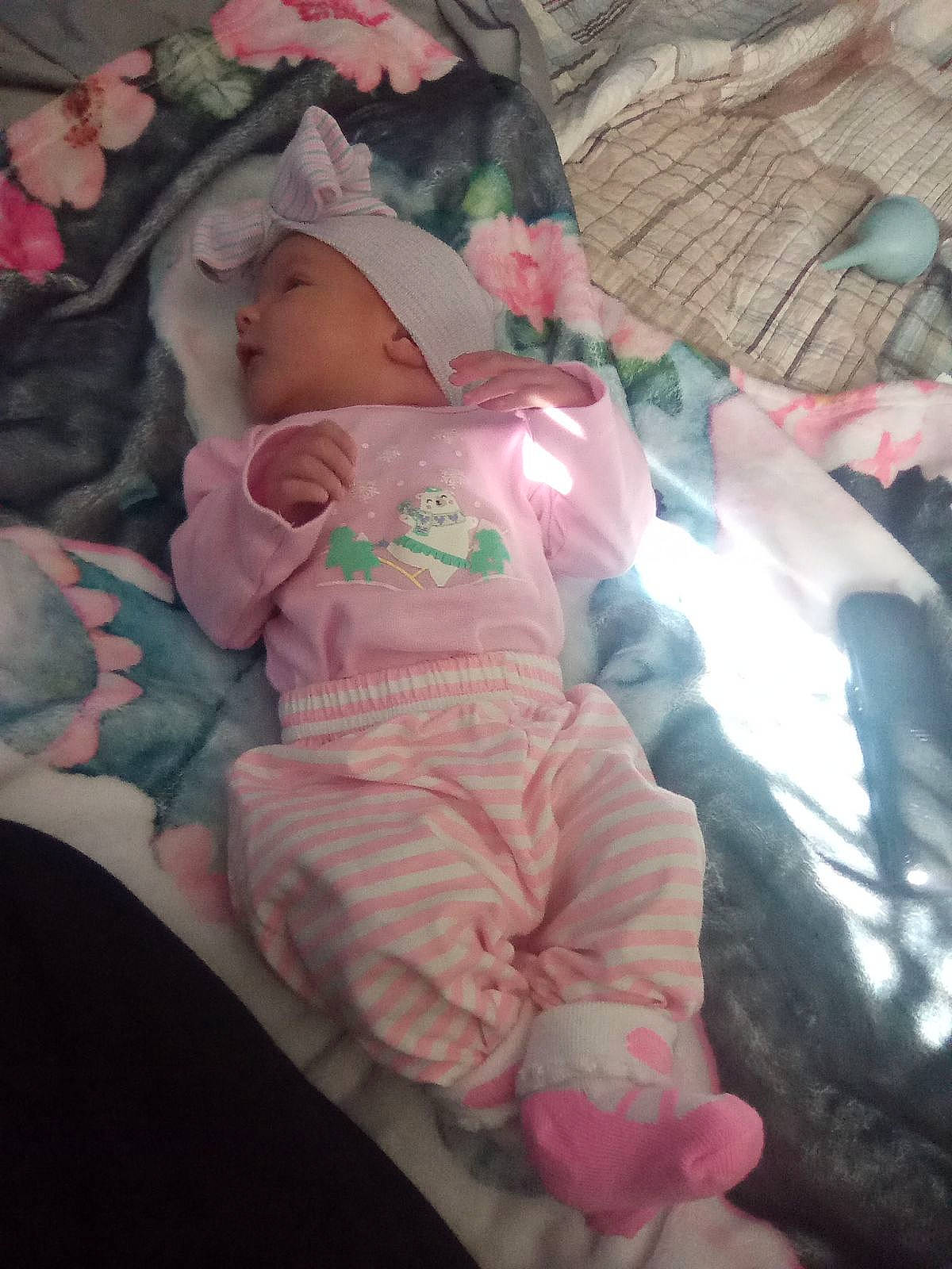 Rebecca joined the competition — help win amazing prizes! baby, baby_products, baby_toddler_clothing, bedtime, cheek, child, comfort, finger, flesh, hat, linens, magenta, mouth, person, pink, room, sitting, skin, sleeve, textile