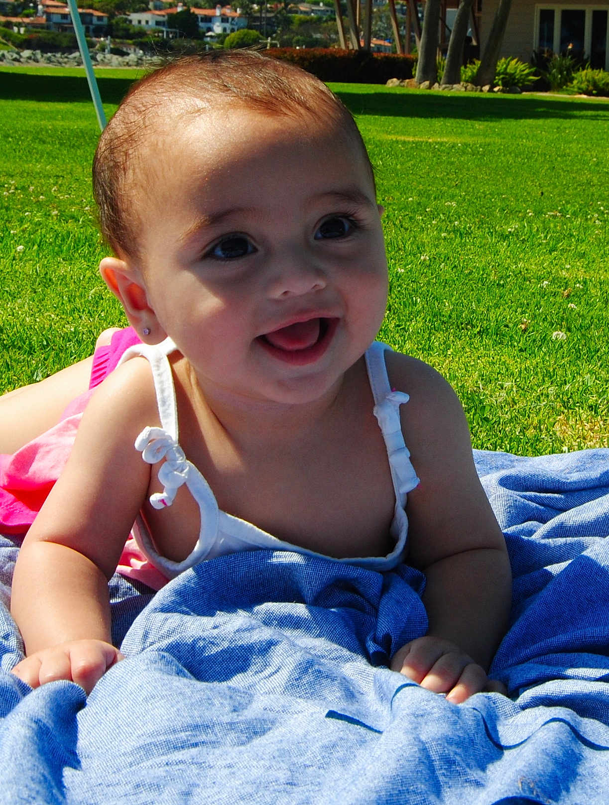Aletha joined the competition — help win amazing prizes! baby, child, smile, happy, grass, blanket, outdoor, sunlight, earrings, toddler, clothing, face, person, greenery, nature, daylight, skin, cute, portrait, summer