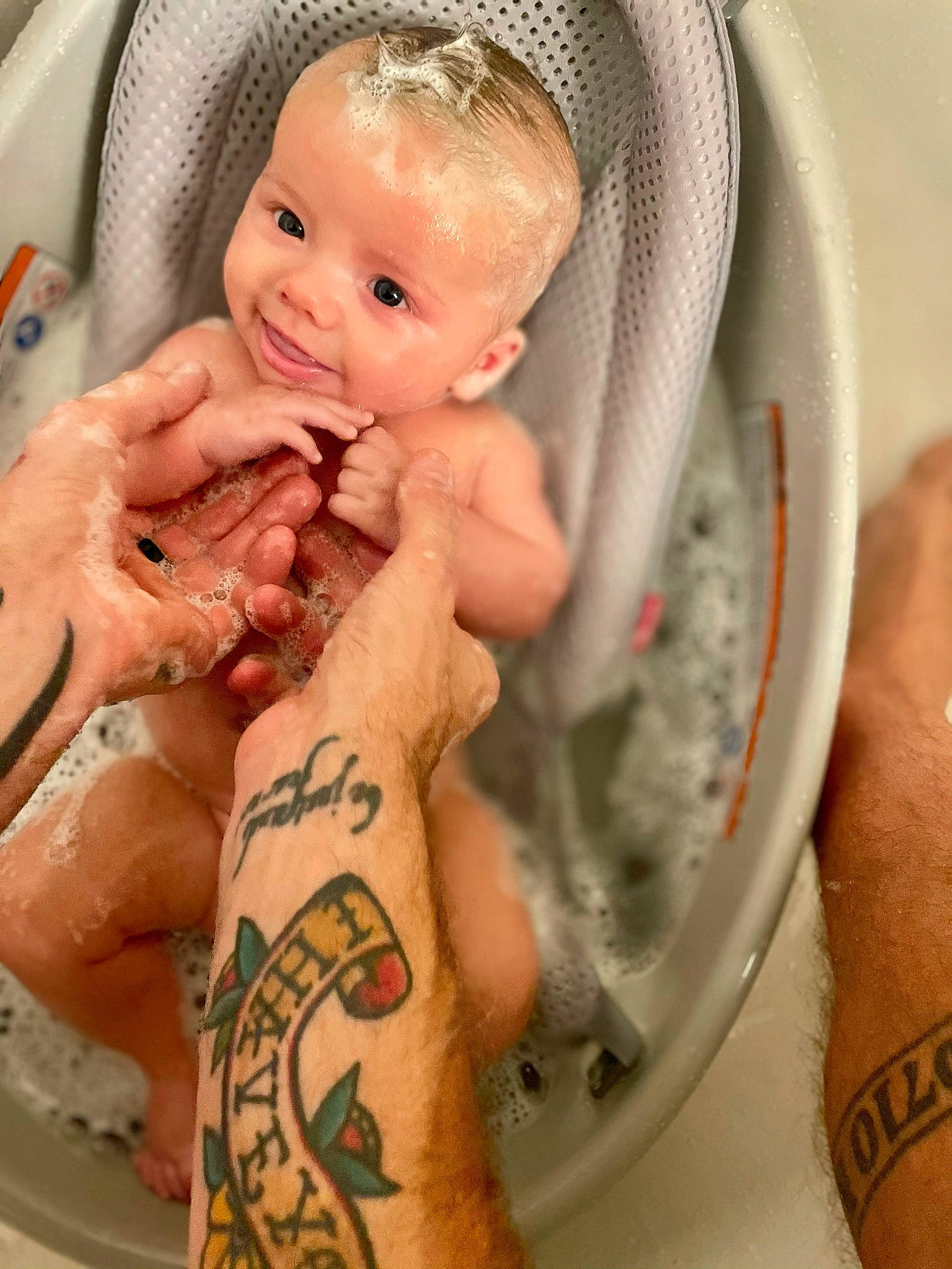 Wolf is registered to the contest to win money with this photo: baby, baby_bathing, baby_toddler_clothing, bathing, cheek, chest, child, finger, fluid, hand, muscle, nail, organ, person, photography, skin, stomach, symbol, thumb, toddler