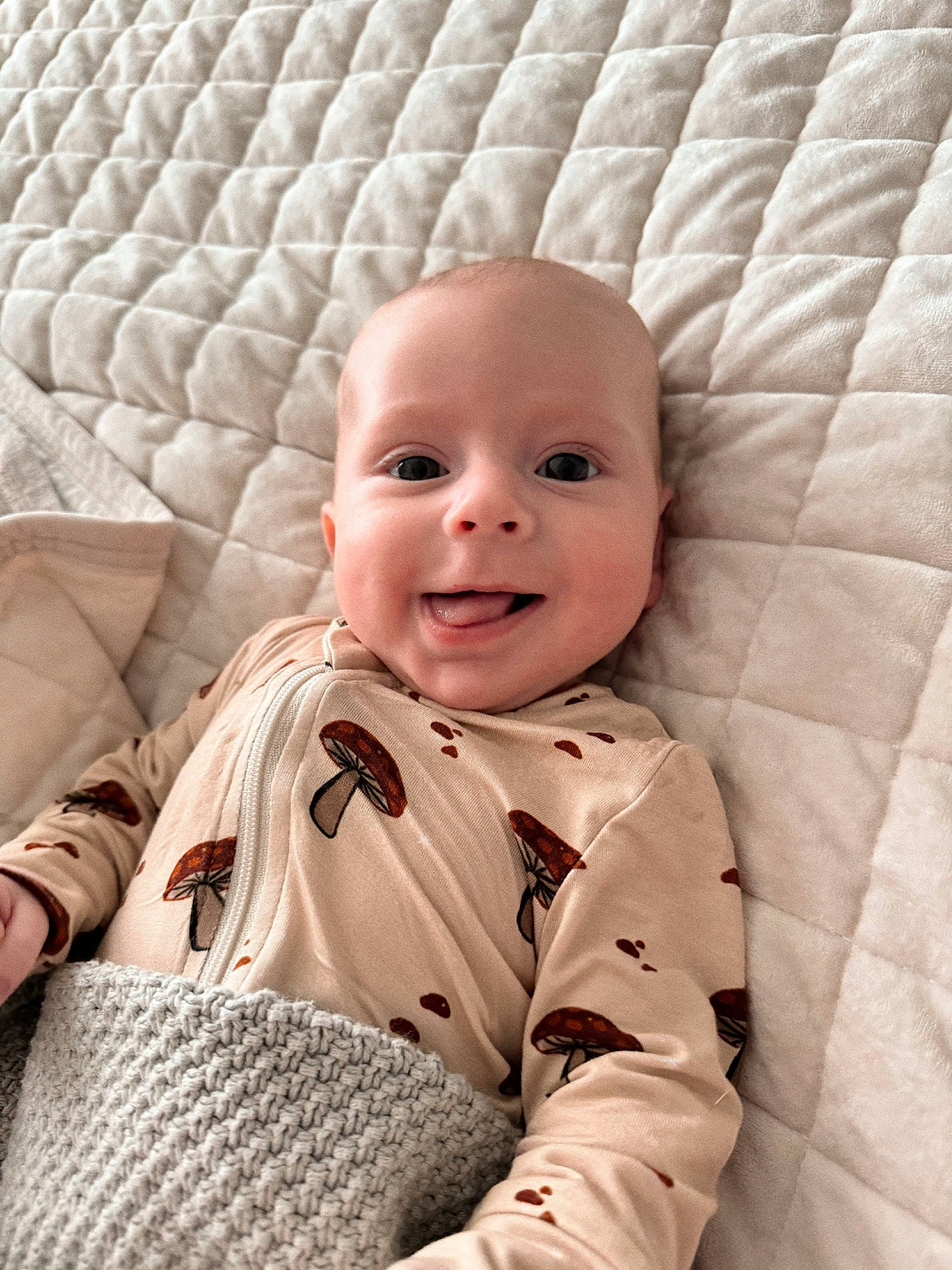 Dallas is registered to the contest to win money with this photo: baby, baby_toddler_clothing, bedding, cheek, child, chin, collar, comfort, eye, flooring, happy, head, headgear, joy, linens, nose, person, room, skin, sleeve