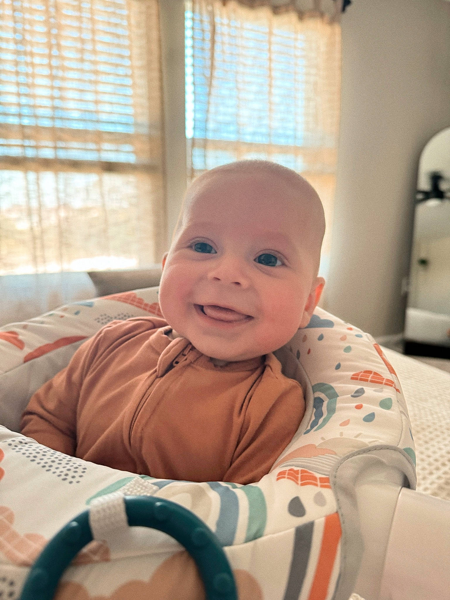 Dallas is registered to the contest to win money with this photo: baby, baby_products, baby_safety, baby_toddler_clothing, cheek, child, comfort, curtain, flooring, fun, happy, joy, mouth, person, sitting, skin, smile, toddler, window, window_blind
