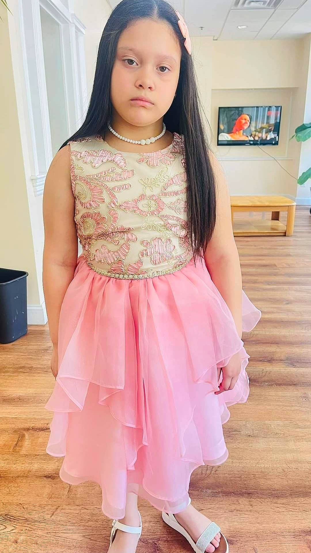 Danisha joined the competition — help win amazing prizes! baby_toddler_clothing, child, clothing, day_dress, dress, embellishment, eyelash, happy, head, leg, magenta, neck, peach, person, pink, skin, sleeve, thigh, toddler, trunk